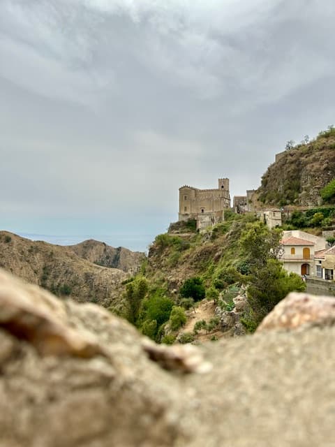 Castle by the rocks.