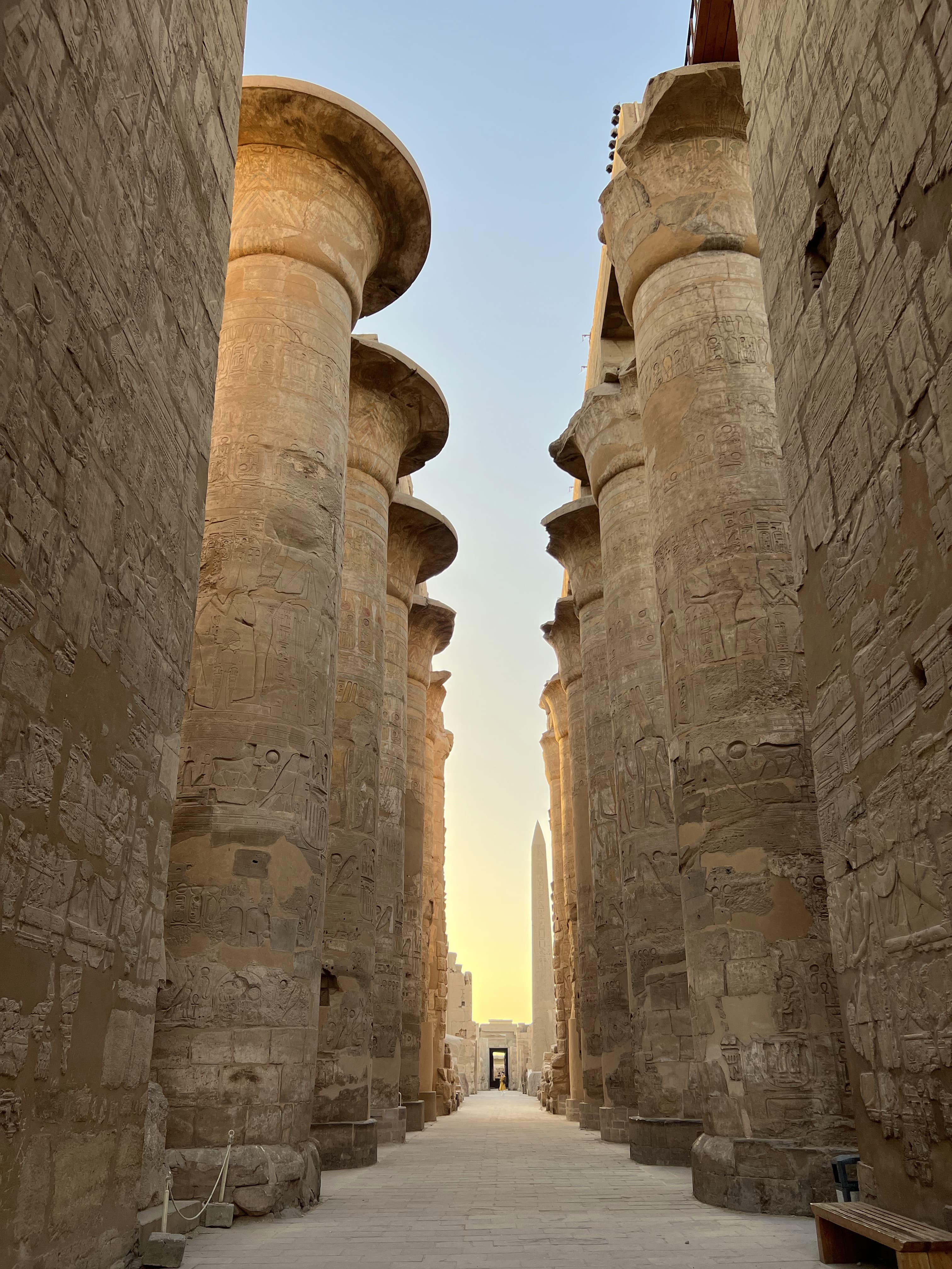 Large stone pillars lining a path.