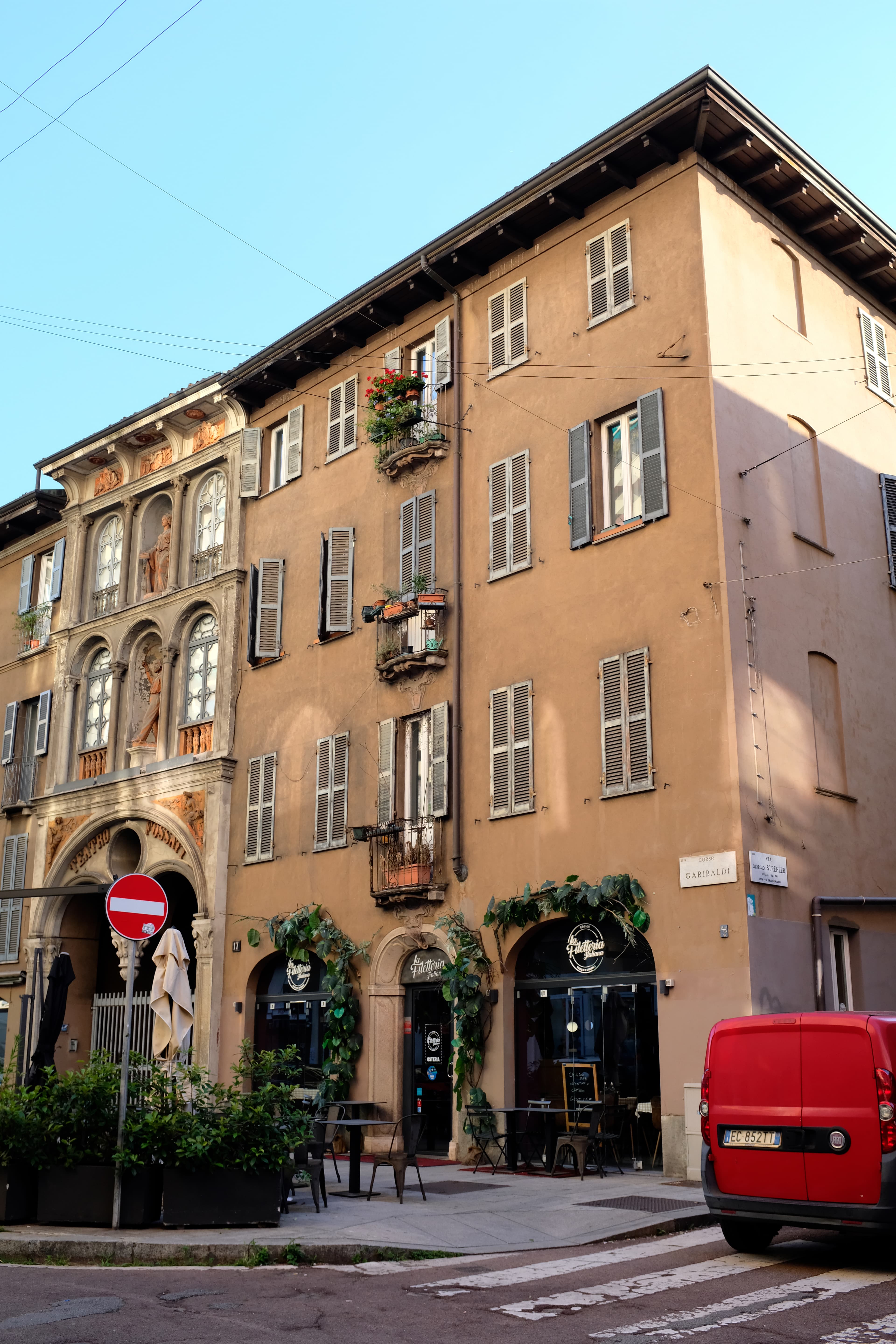 A quaint city block on a sunny day.