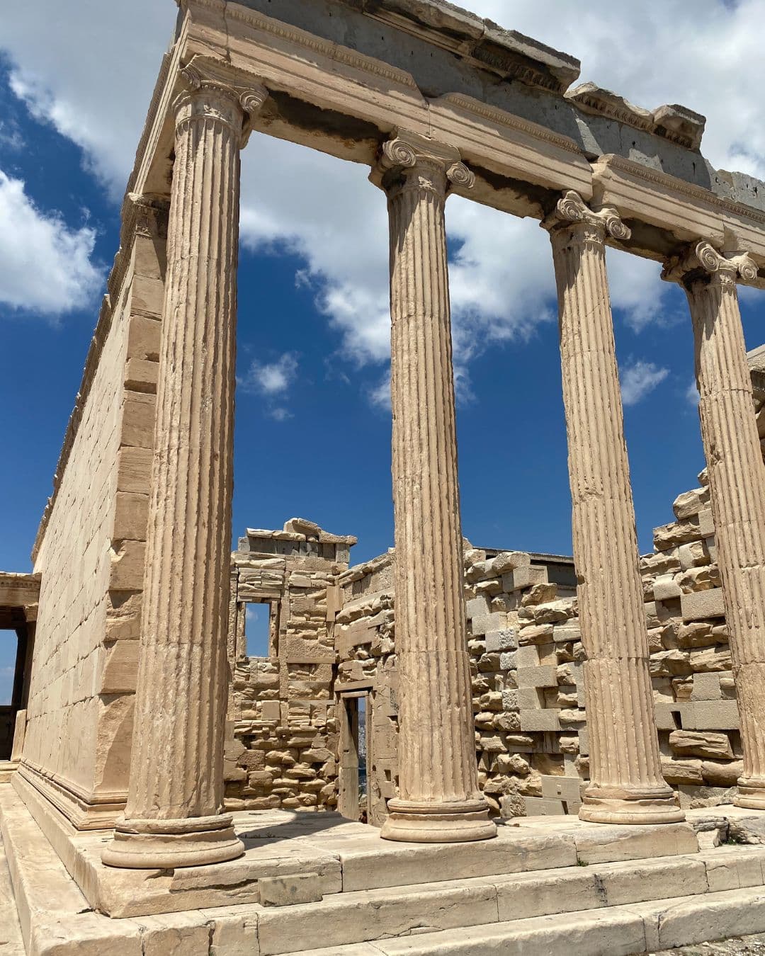 Close up view of ancient columns and ruins on a sunny day