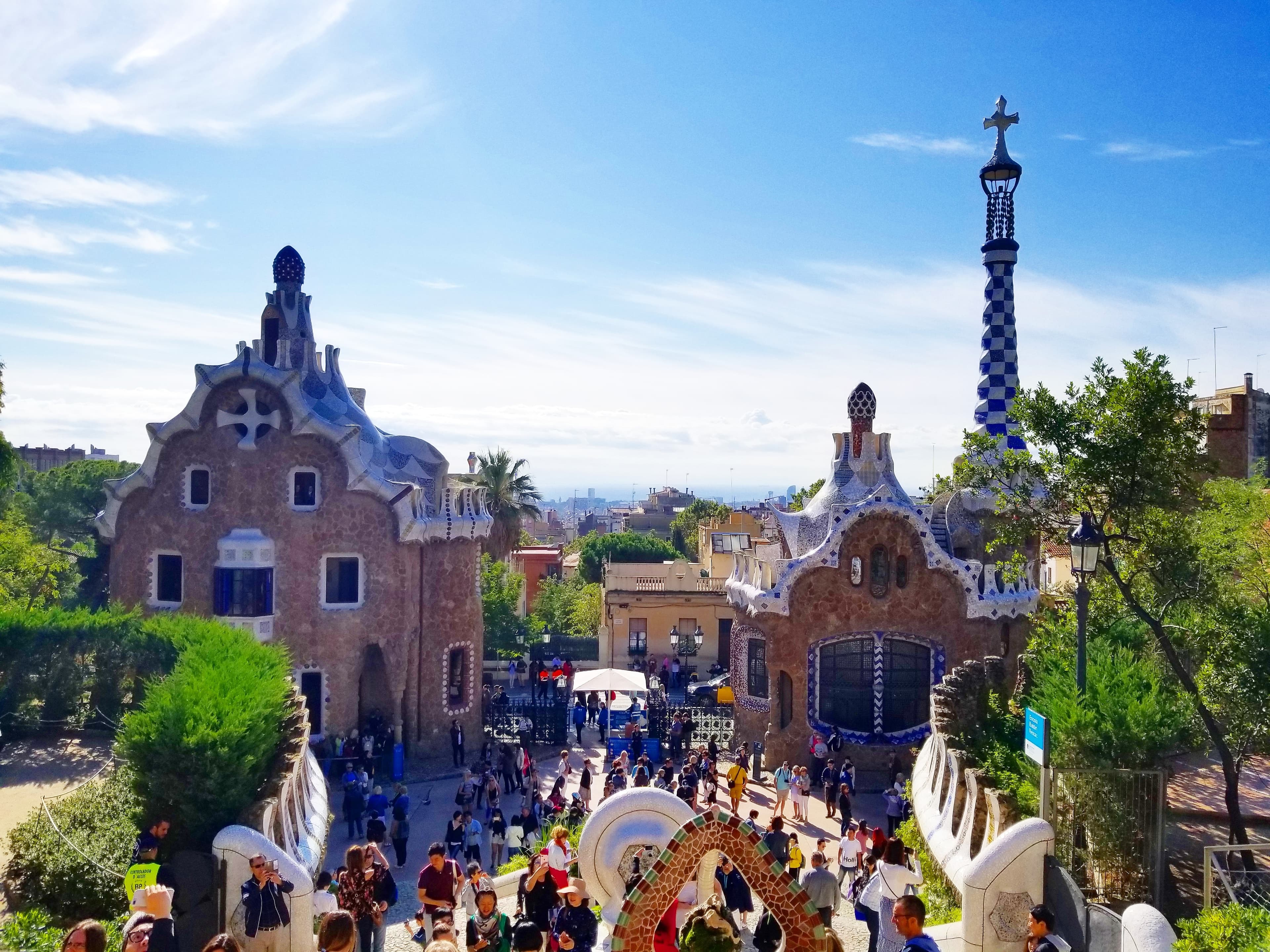 View of Gaudi’s Park Guell full of tourists on a sunny day in Barcelona
