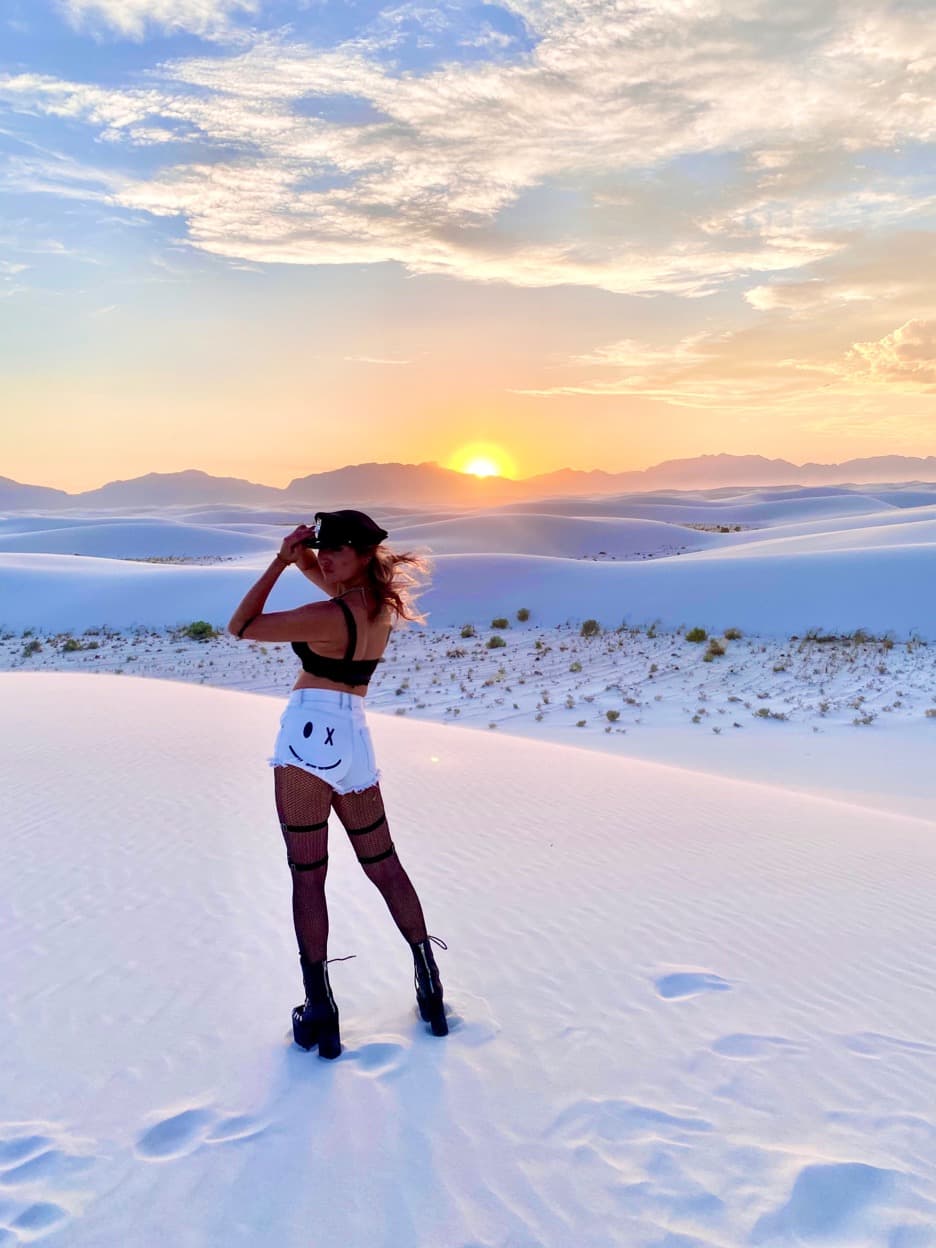 Sunset over white sands.