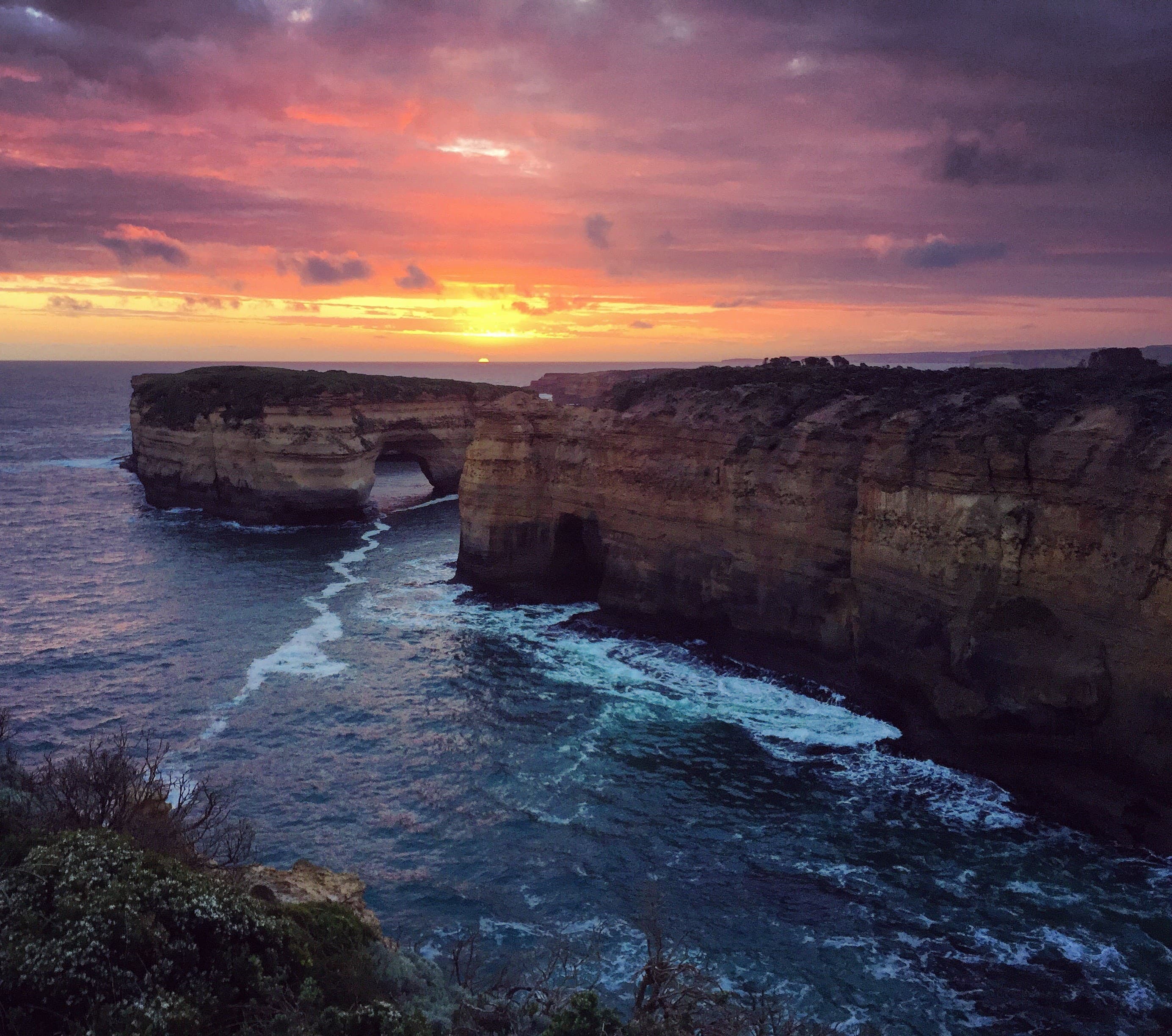 Beautiful view of dramatic cliffs and the sea at sunset