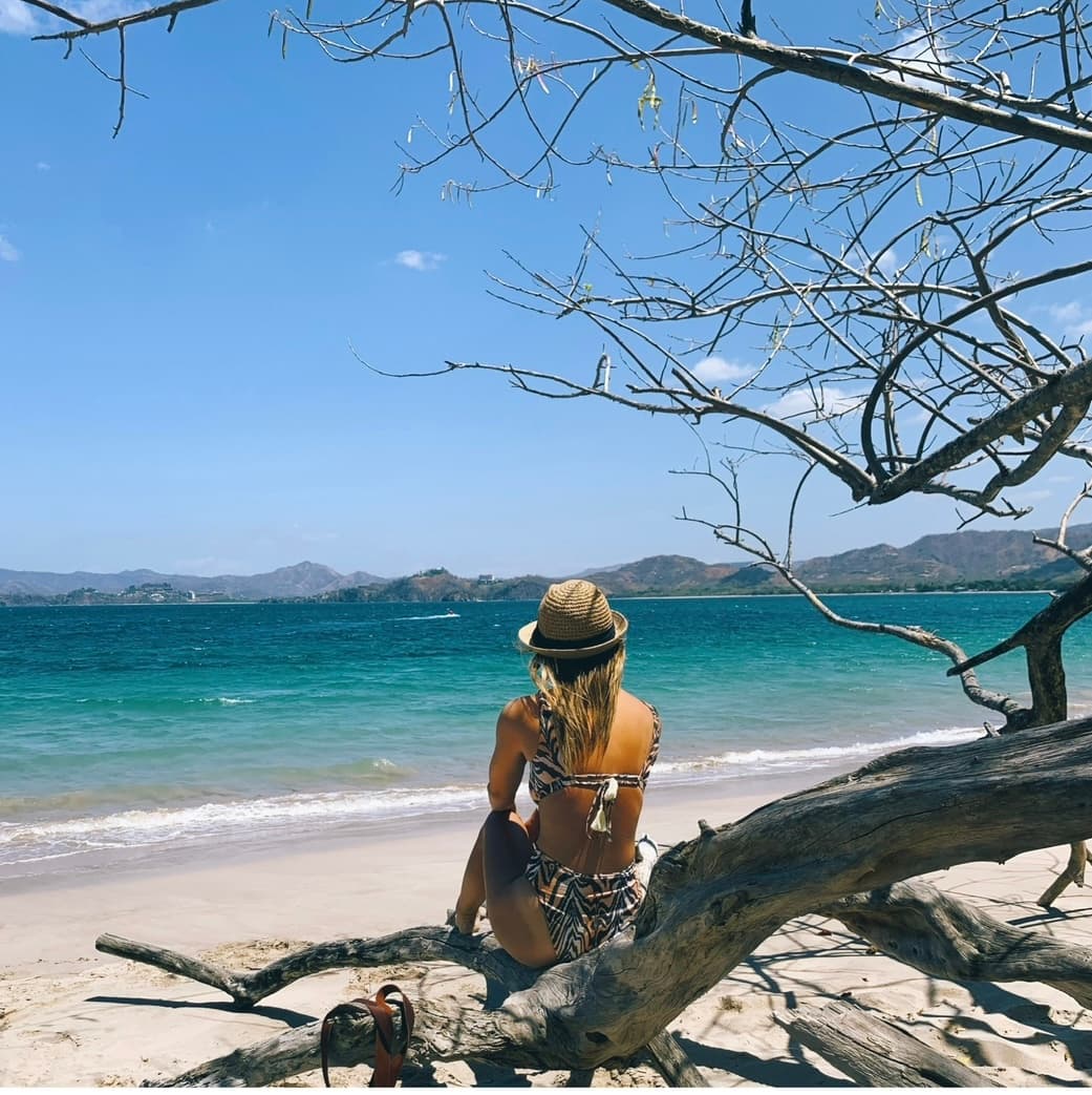 Meagan posing on beach during the daytime.