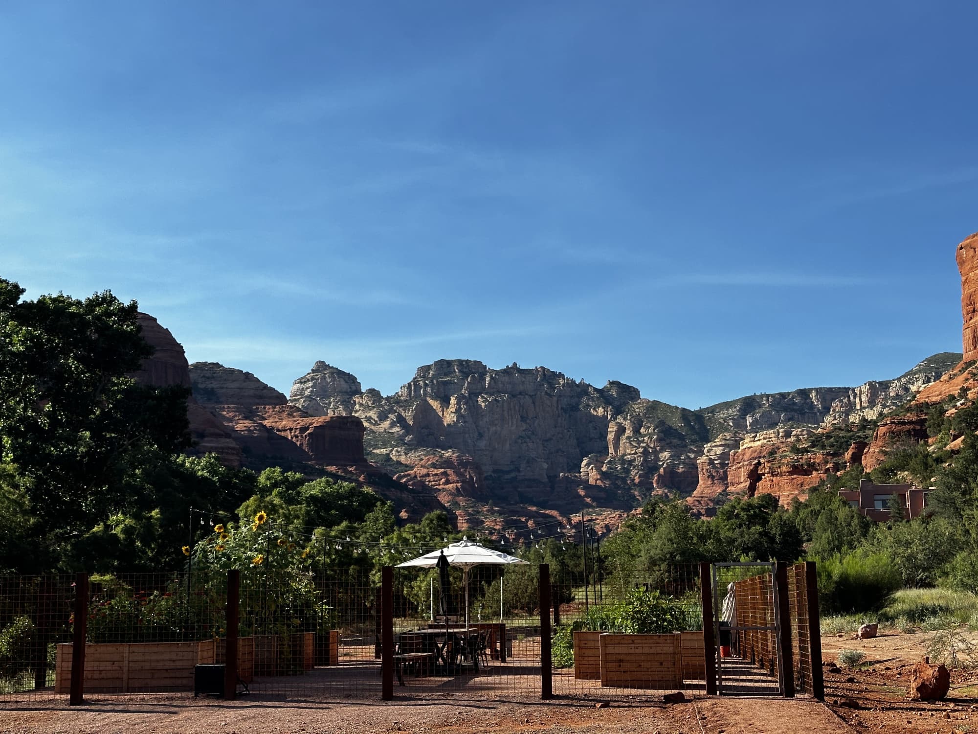 View of a sitting area in front of the canyons on a sunny day.
