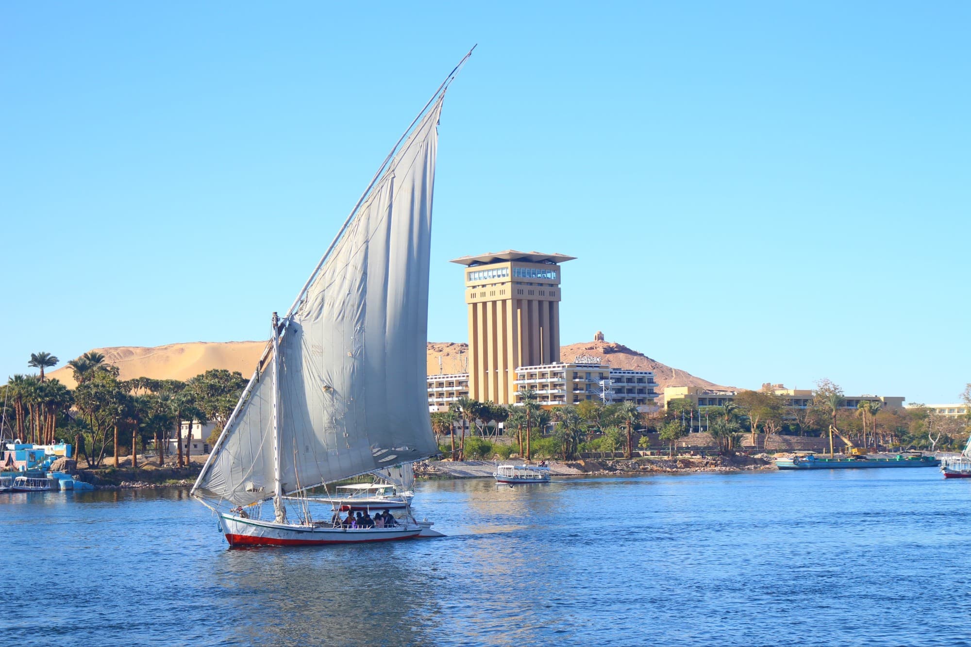 sail boat on a river on a sunny day