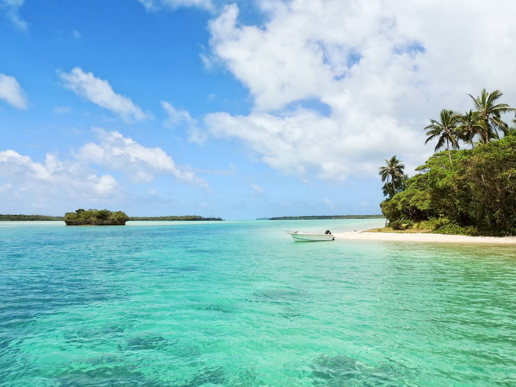 Clear blue water and white sand on a sunny day in Montego Bay, Jamaica