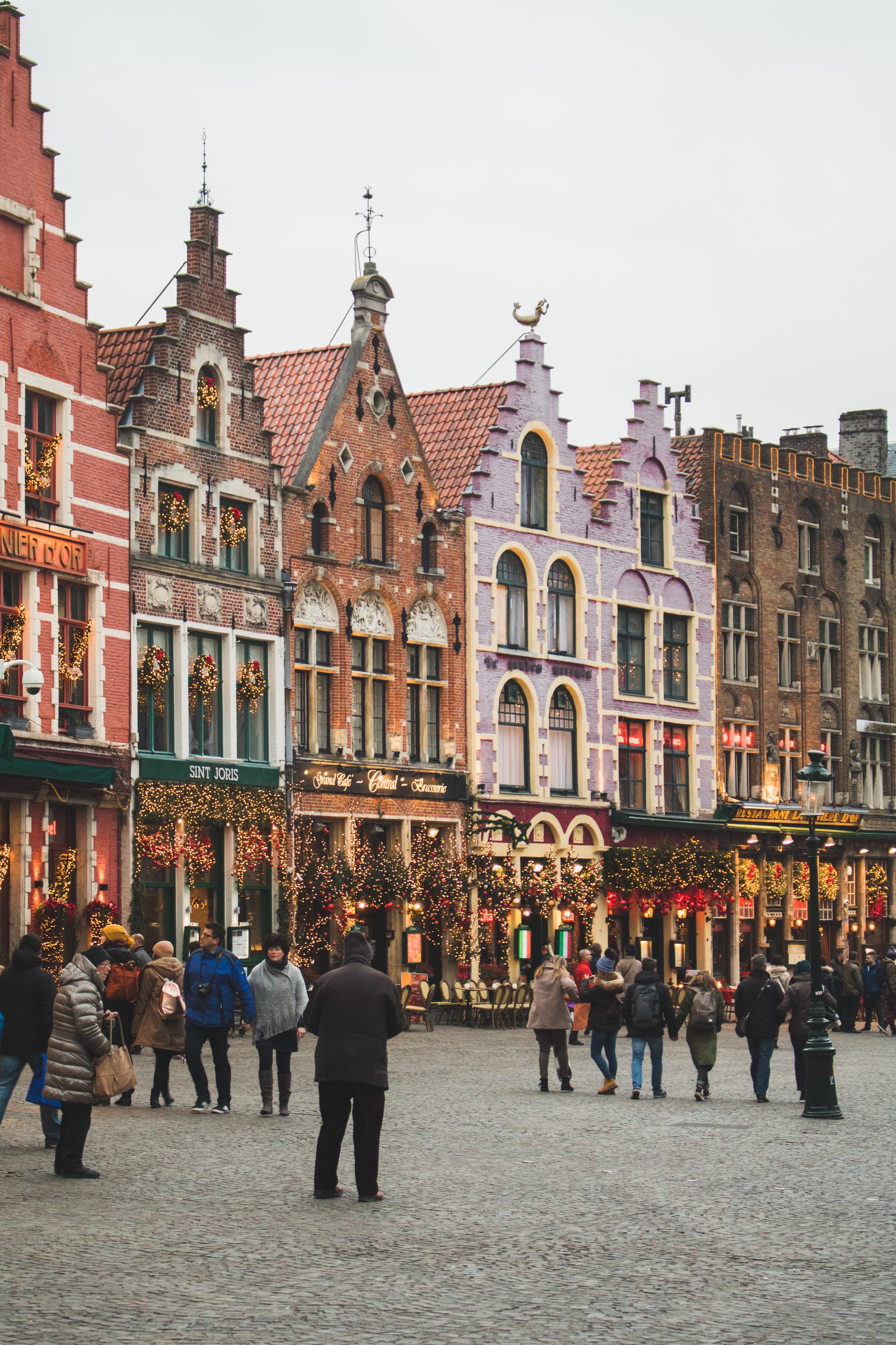 people standing in front of buildings during daytime