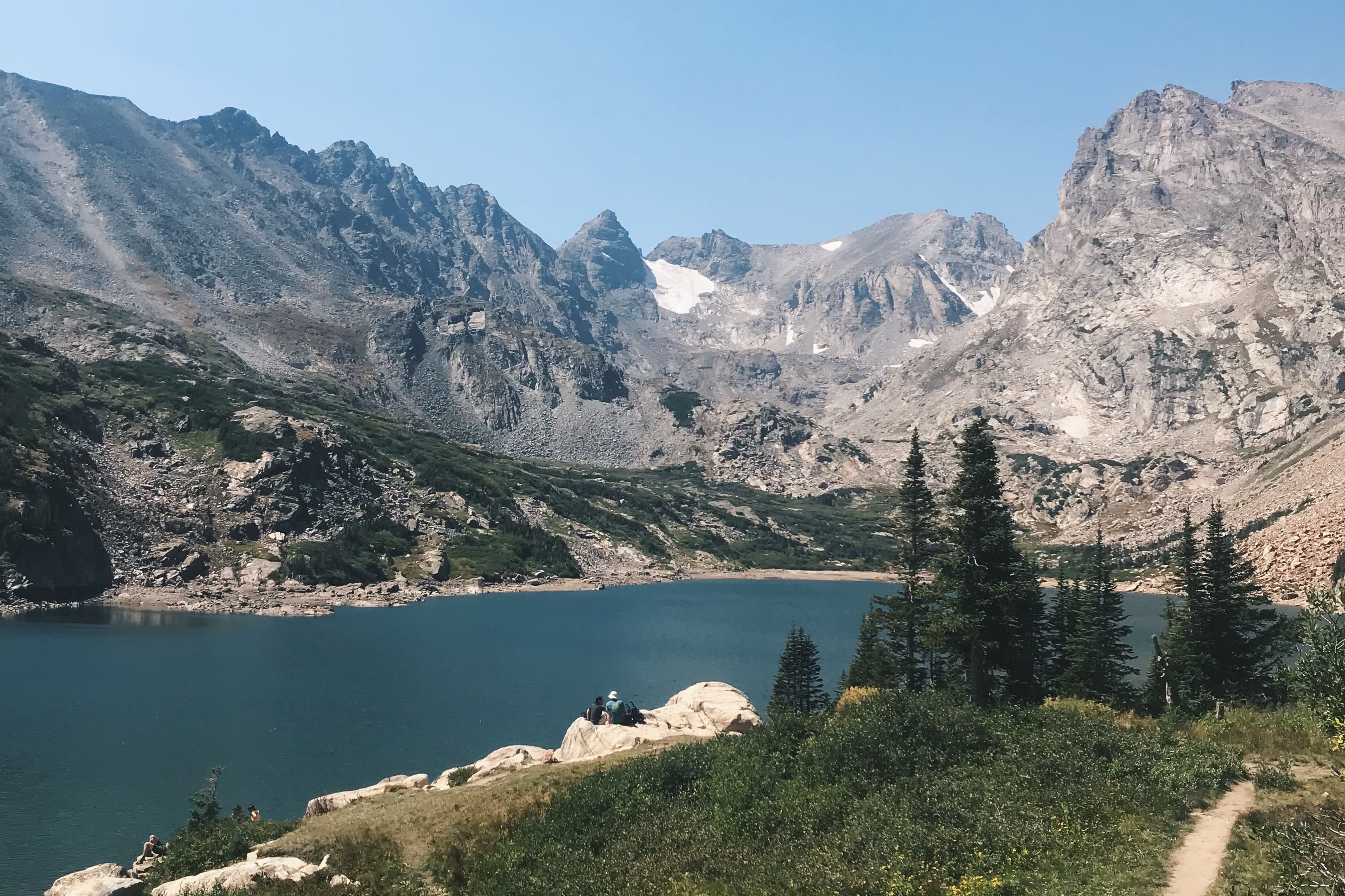 A lake surrounded by mountains