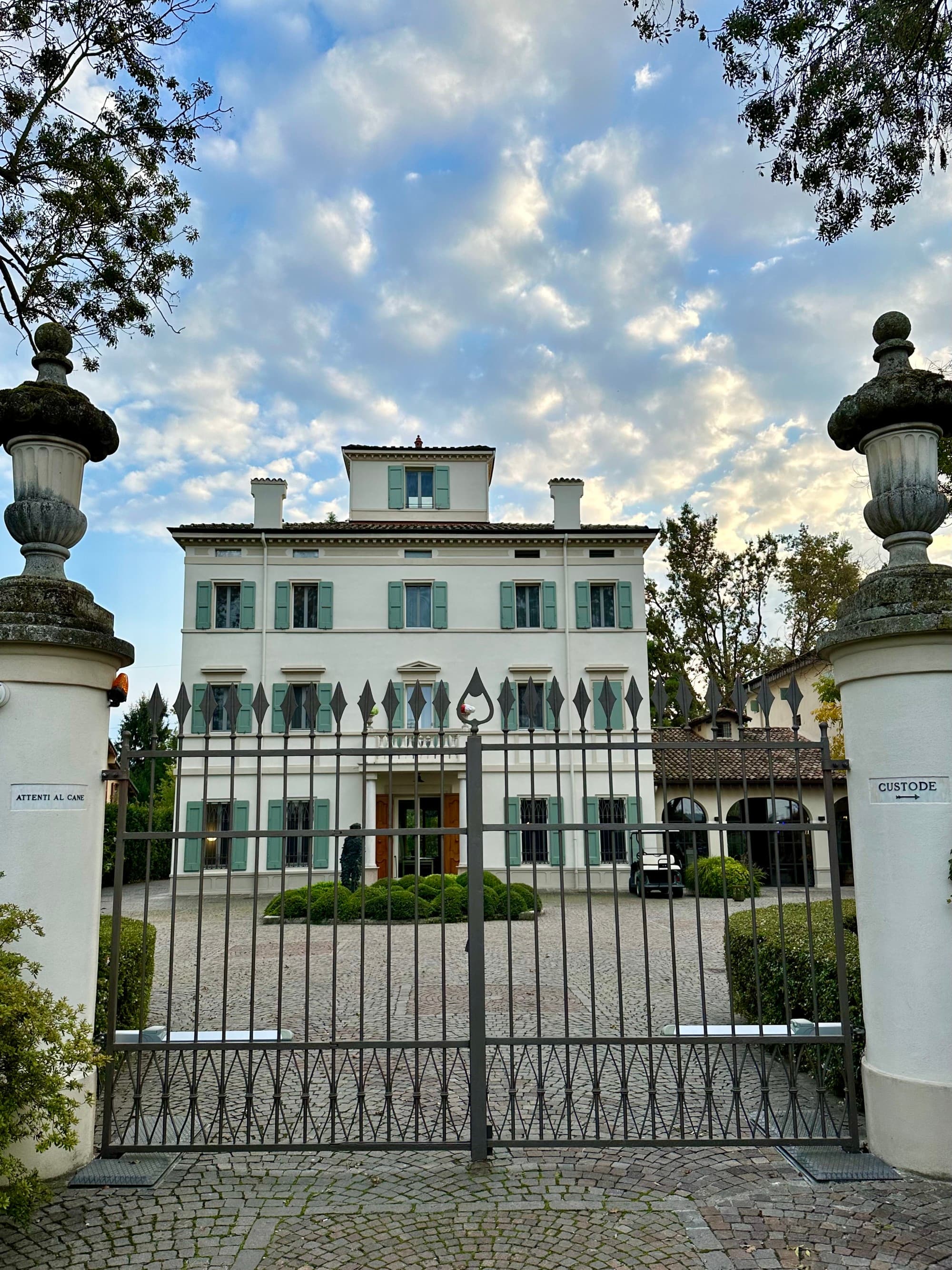 hotel entrance behind a gate