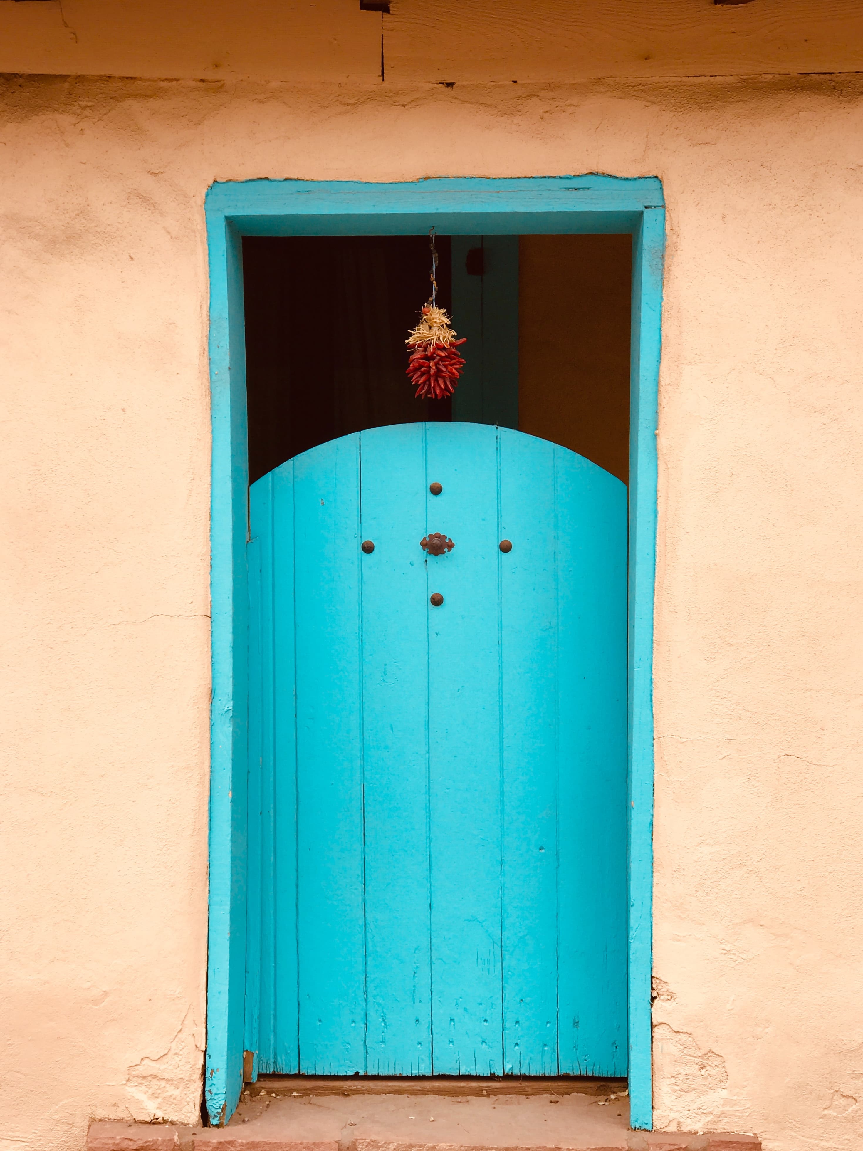 Blue door on adobe building in Santa Fe, New Mexico