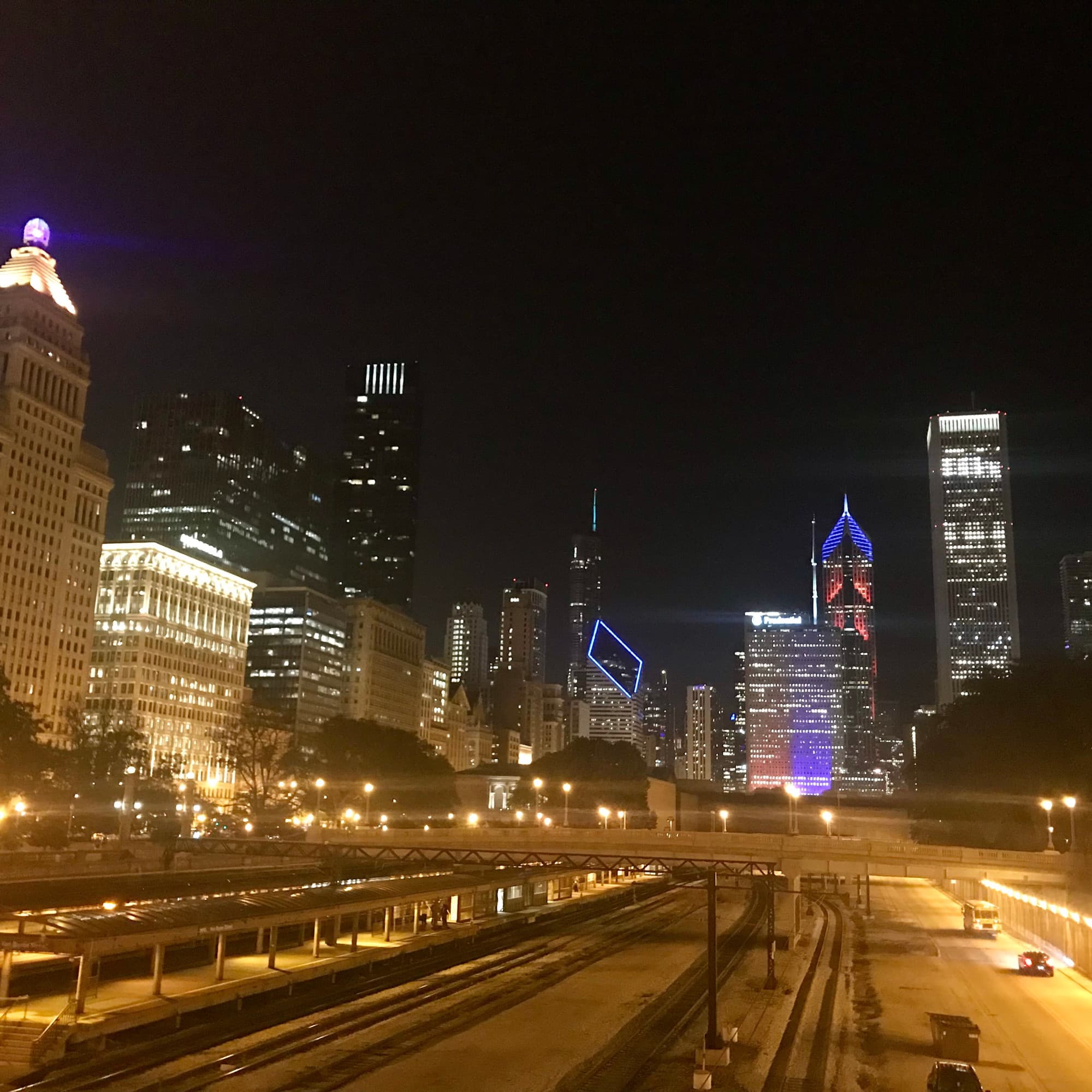 A skyline of the city during nighttime.