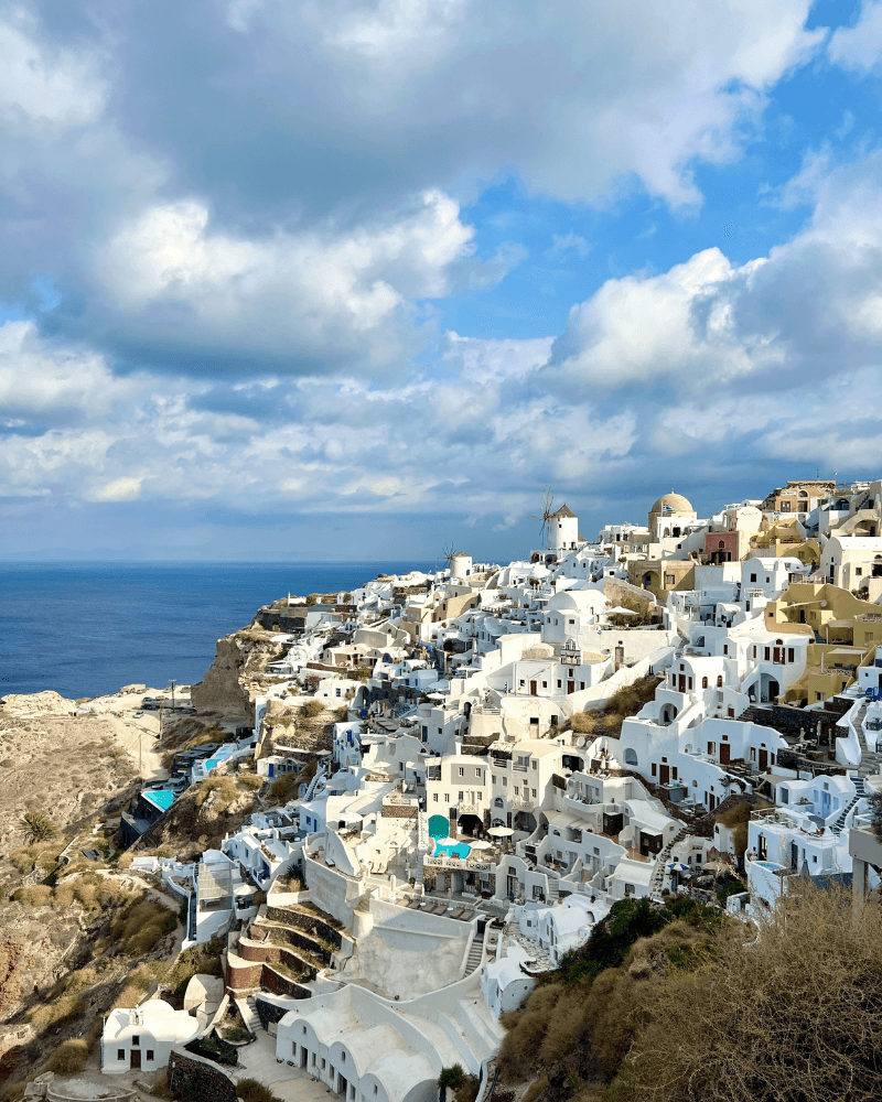 An aerial view of an island with many white houses