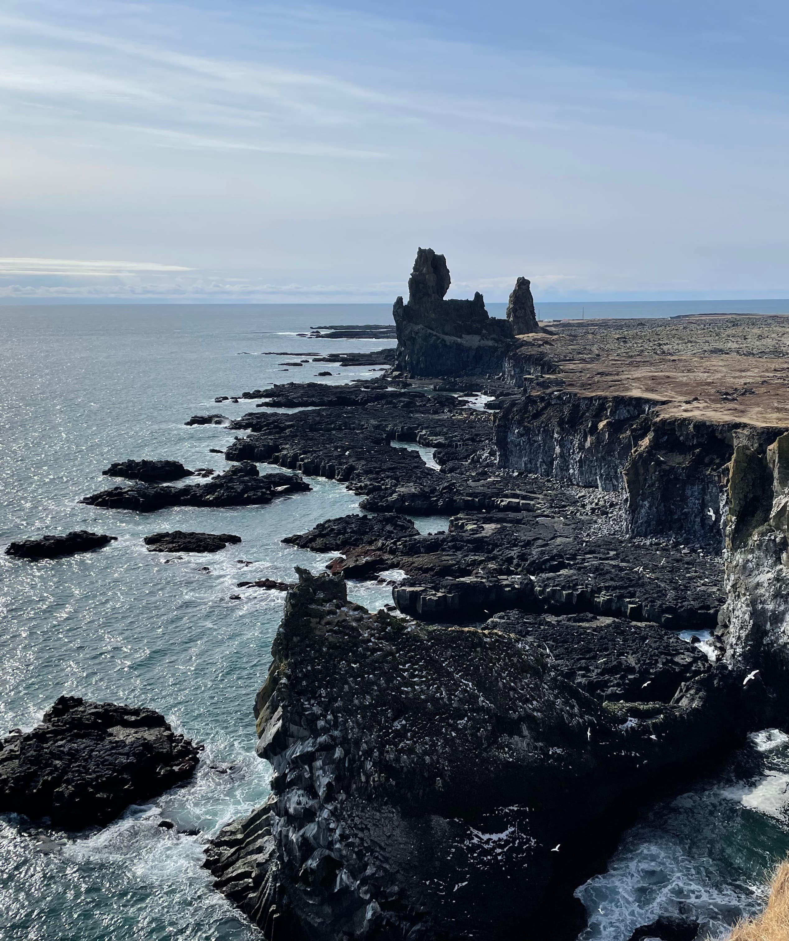 Lóndrangar is Iceland's view point of striking basalt sea stack and ancient volcanic remnants.