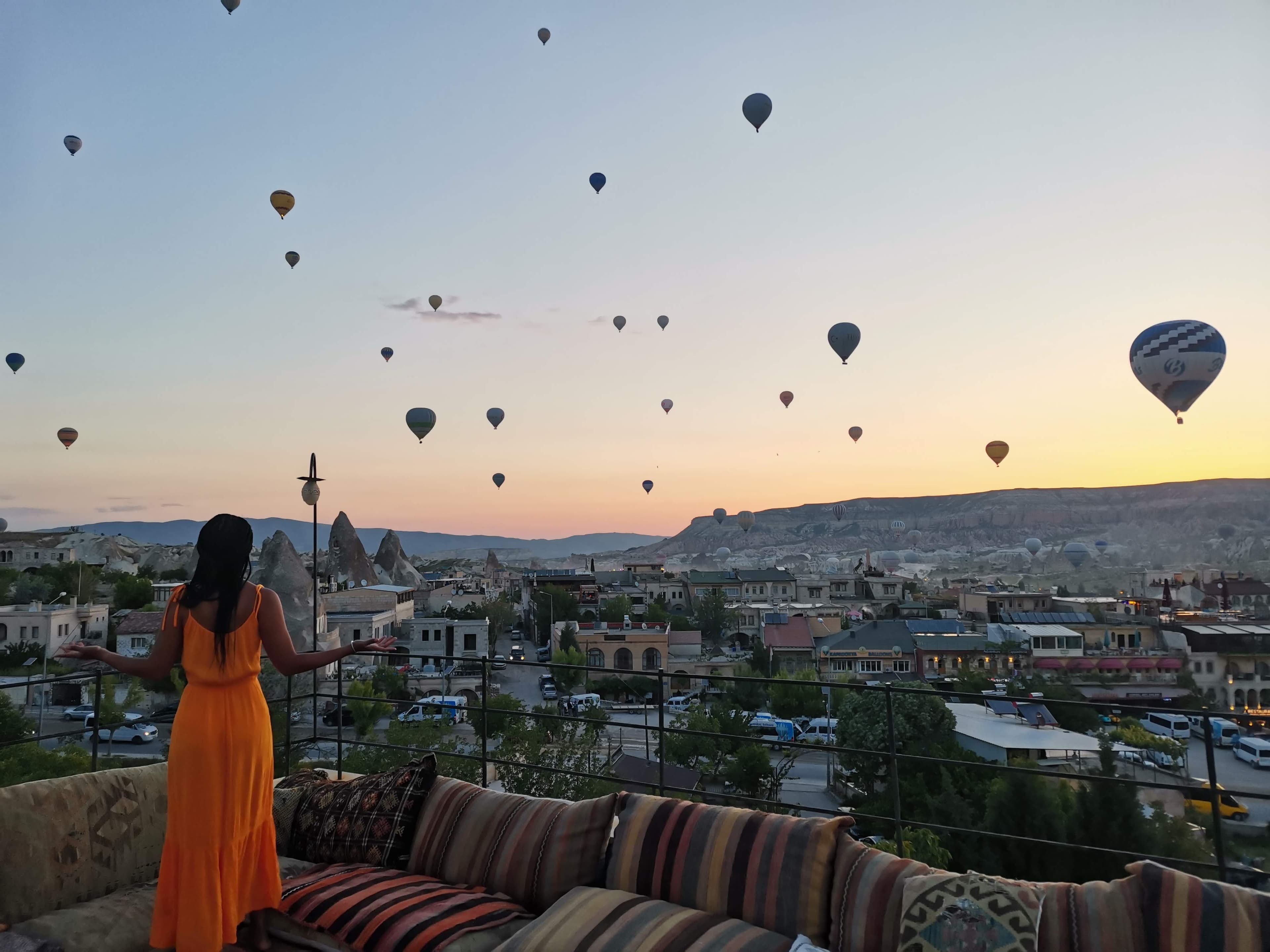 Hot air balloons in the air during sunset