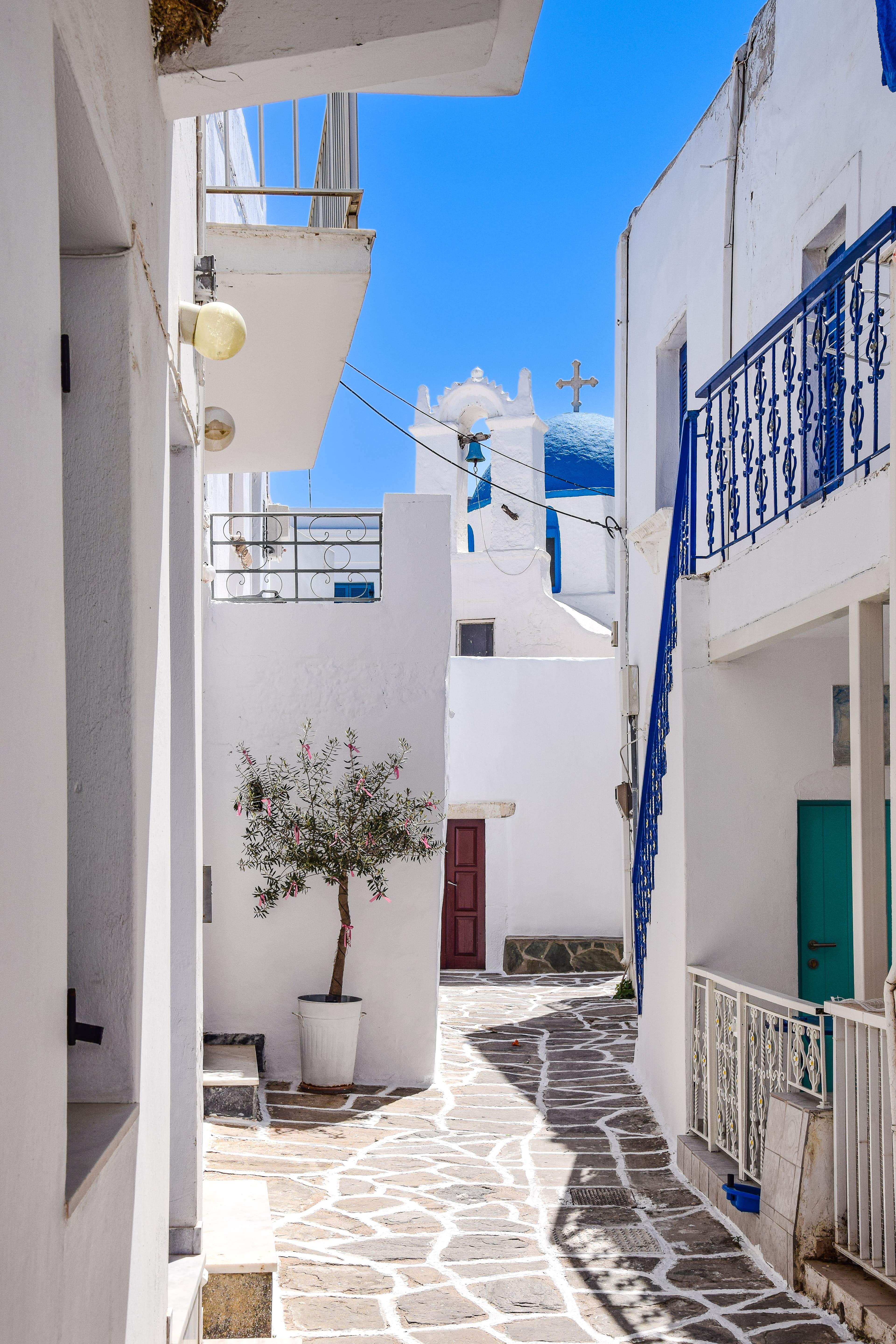 white building overlooking body of water