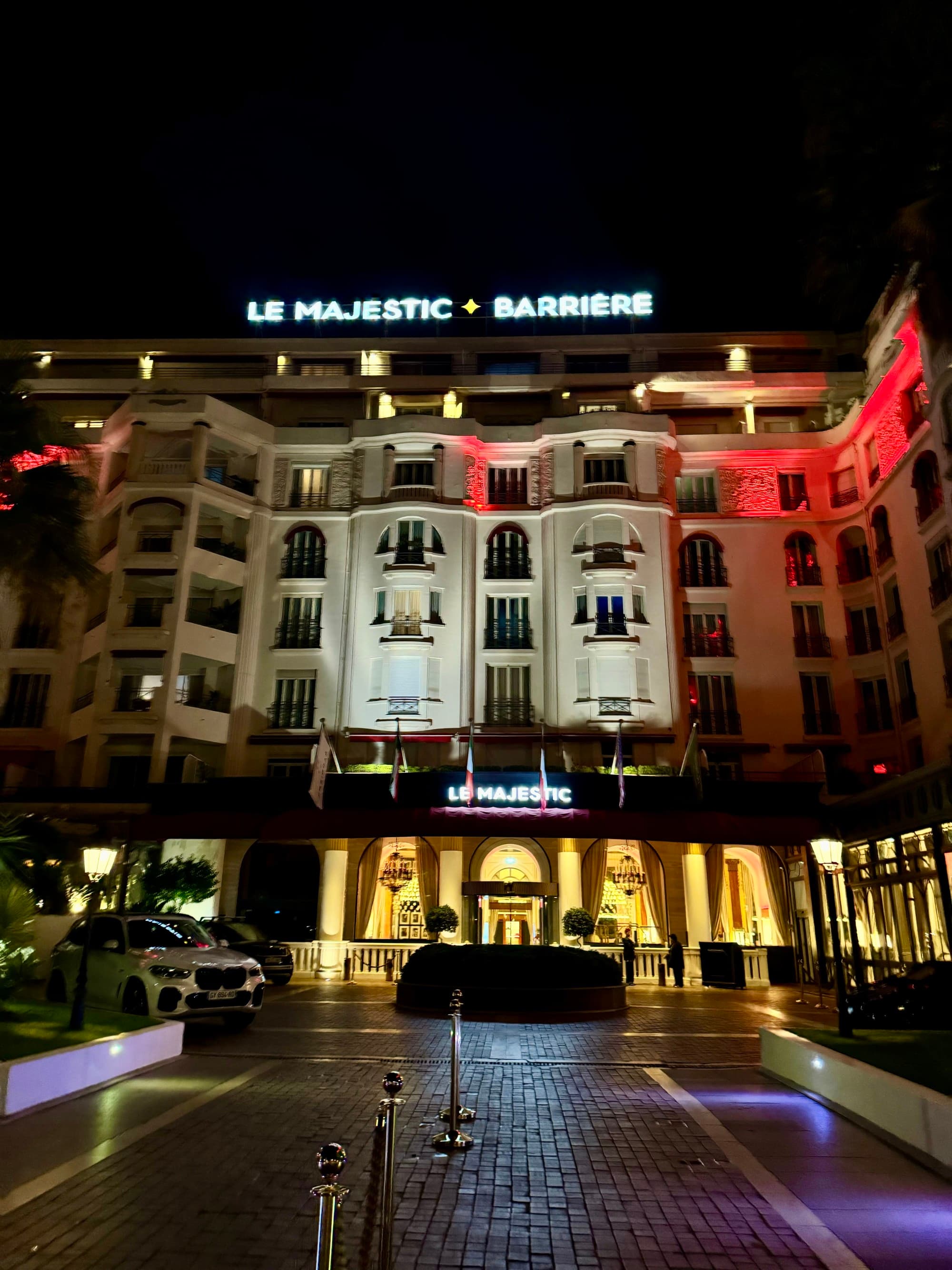 Outside view of the hotel on a clear night.
