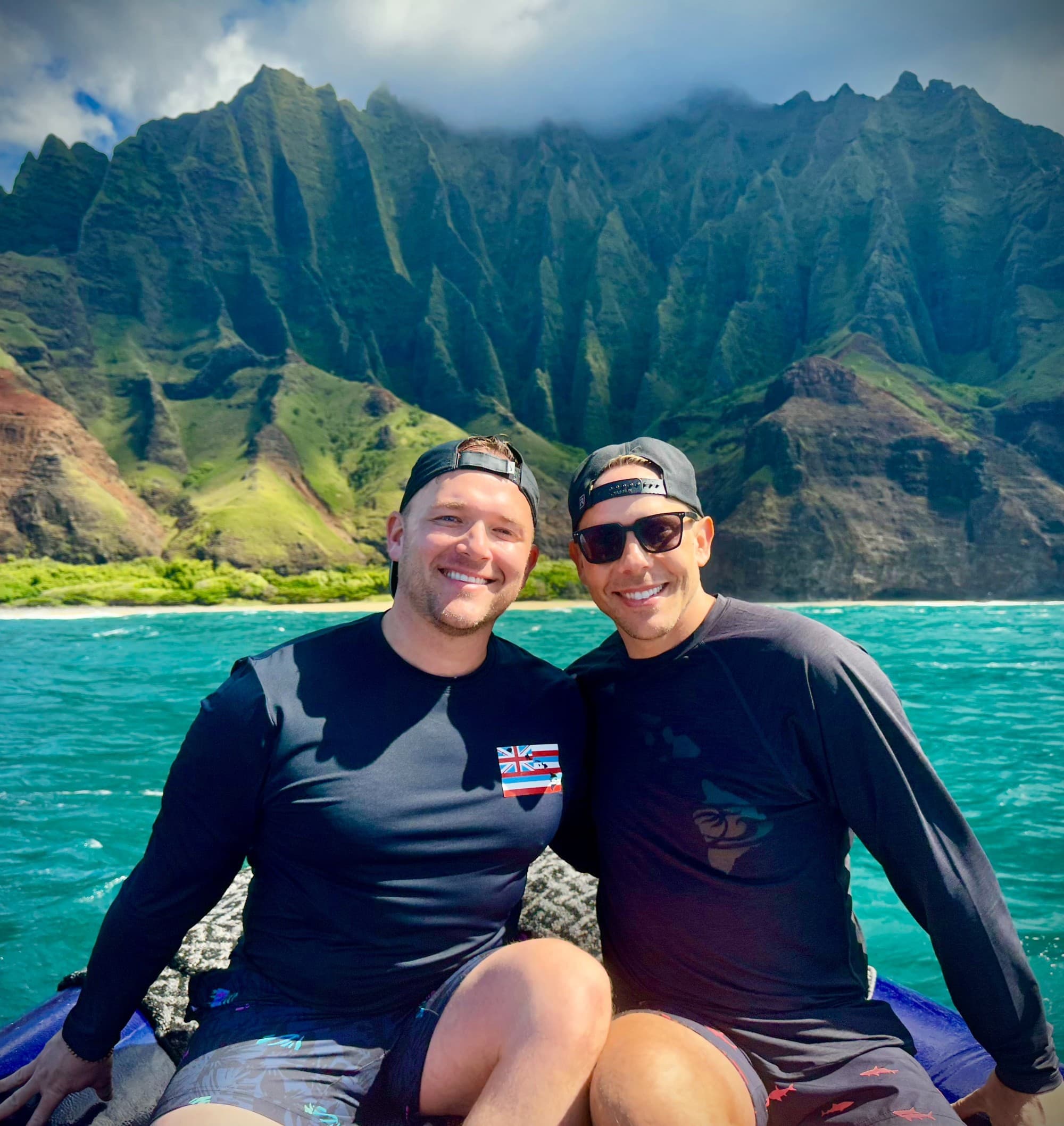 Epic photo-op in front of the stunning cliffs of the Na Pali Coast.