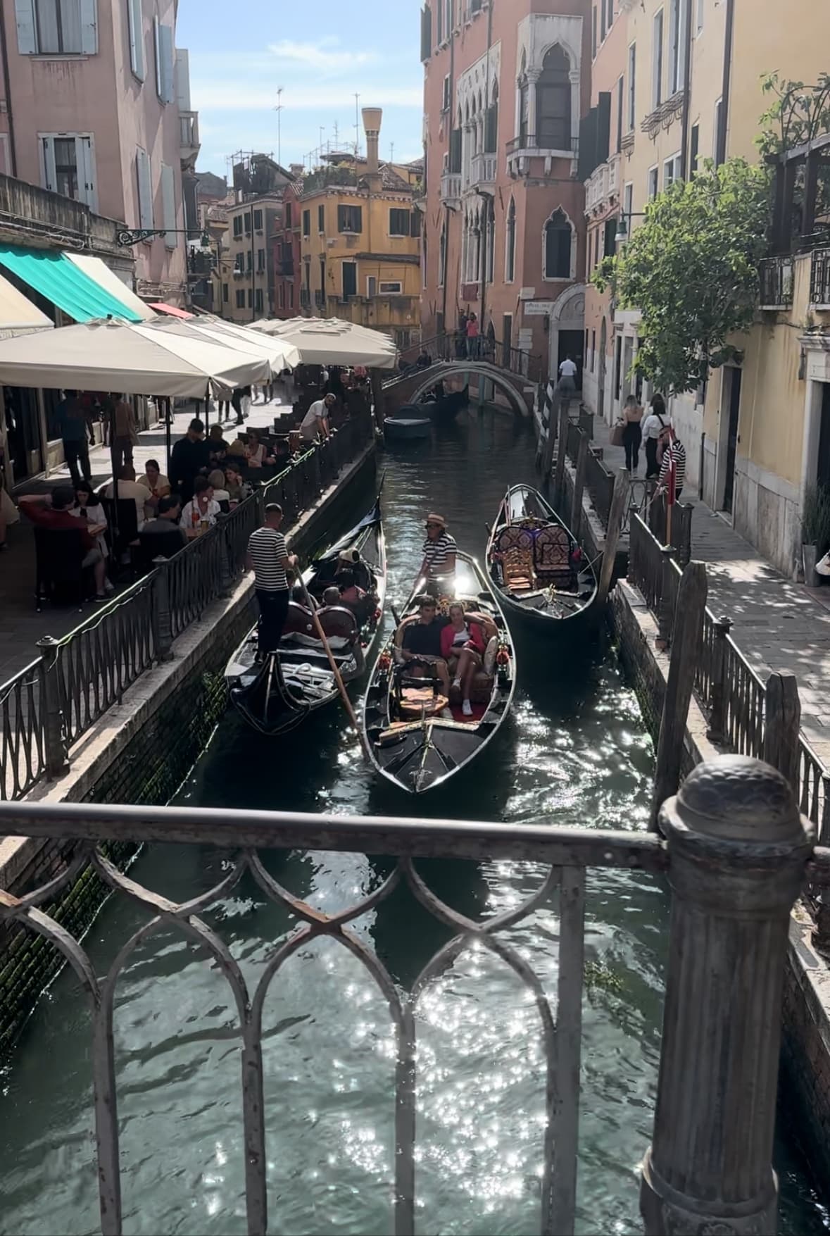 Gondolas in a city canal.