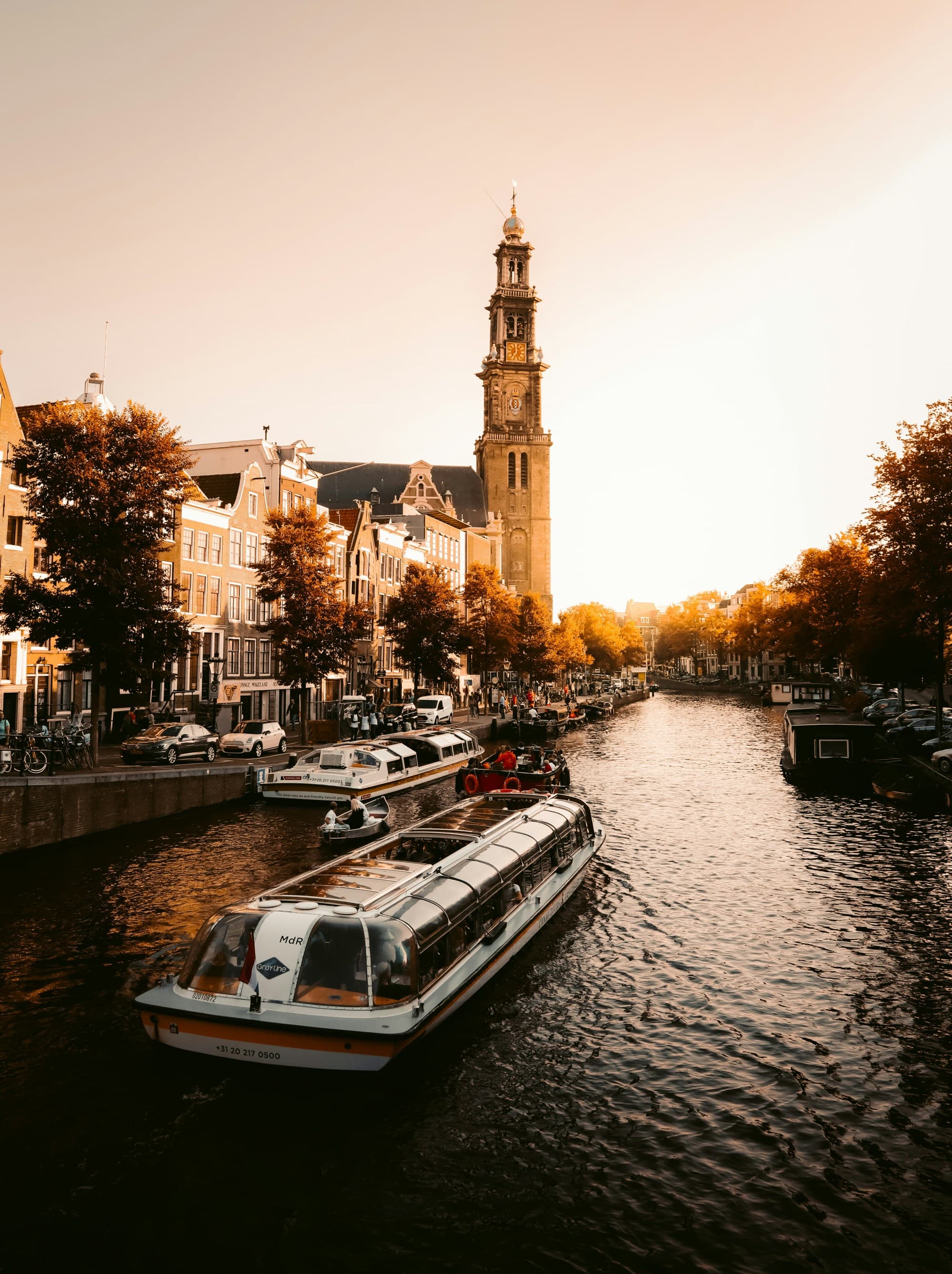 A cruise boat on a canal in Amsterdam.