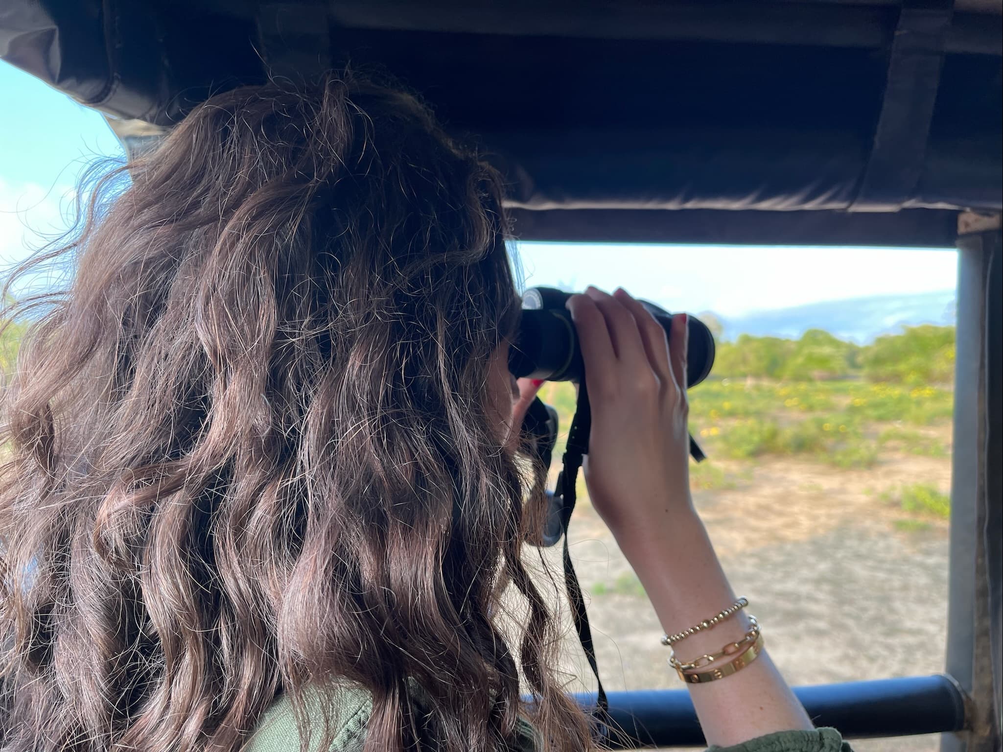 A girl looking inside a spectacle.