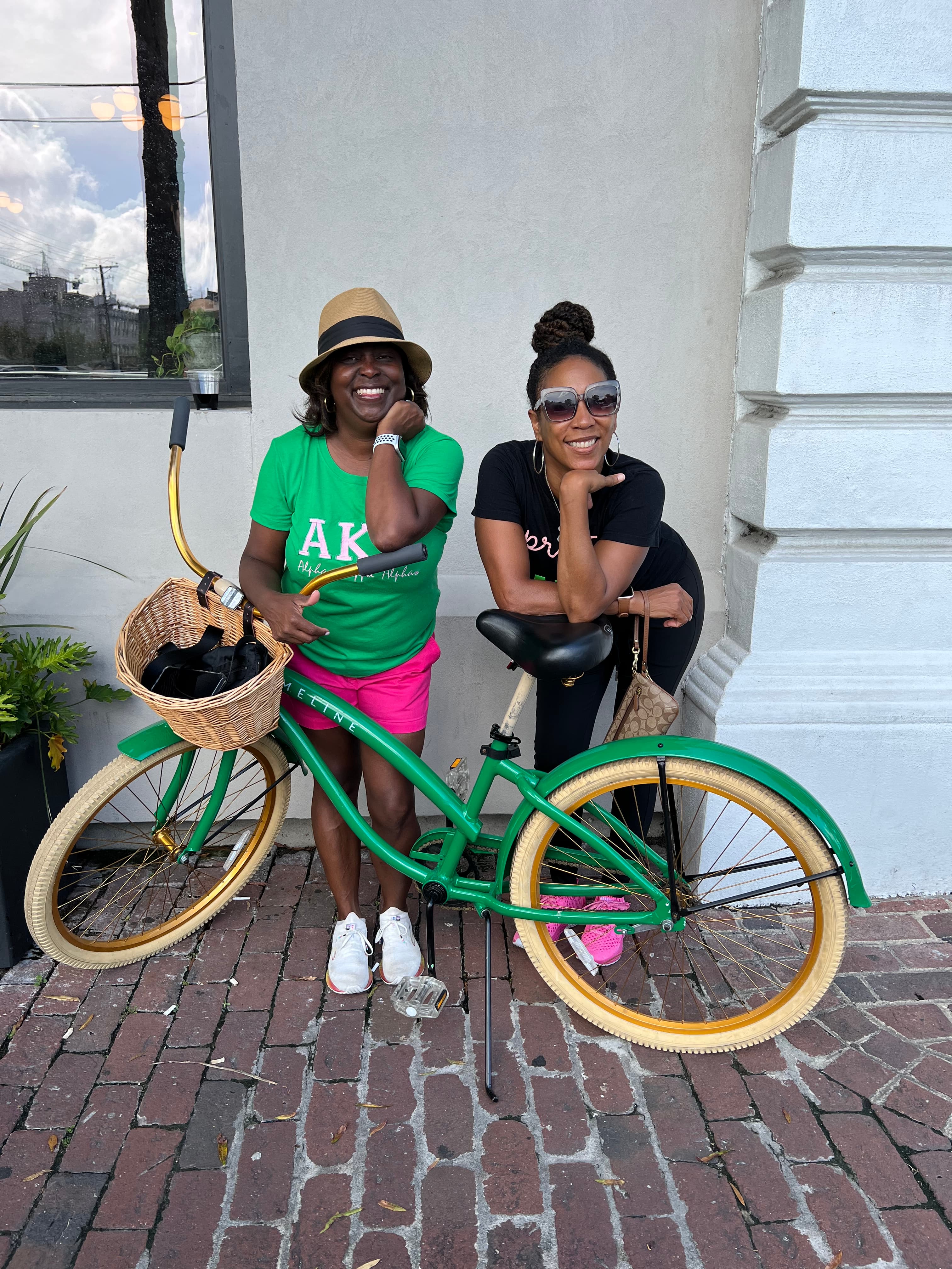 A image of girls enjoying a nice day with bicycles