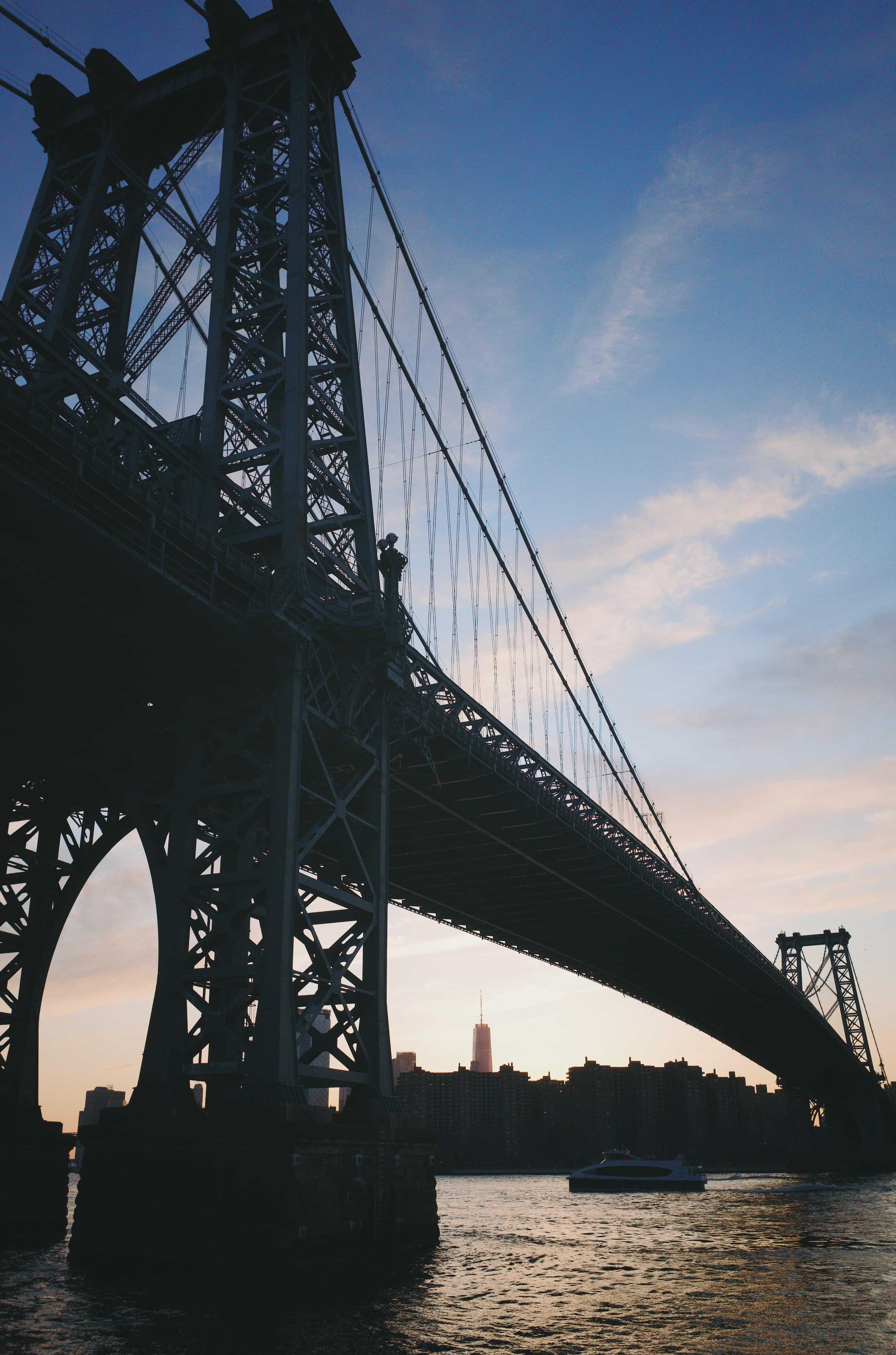 The Williamsburg Bridge with blue sky.