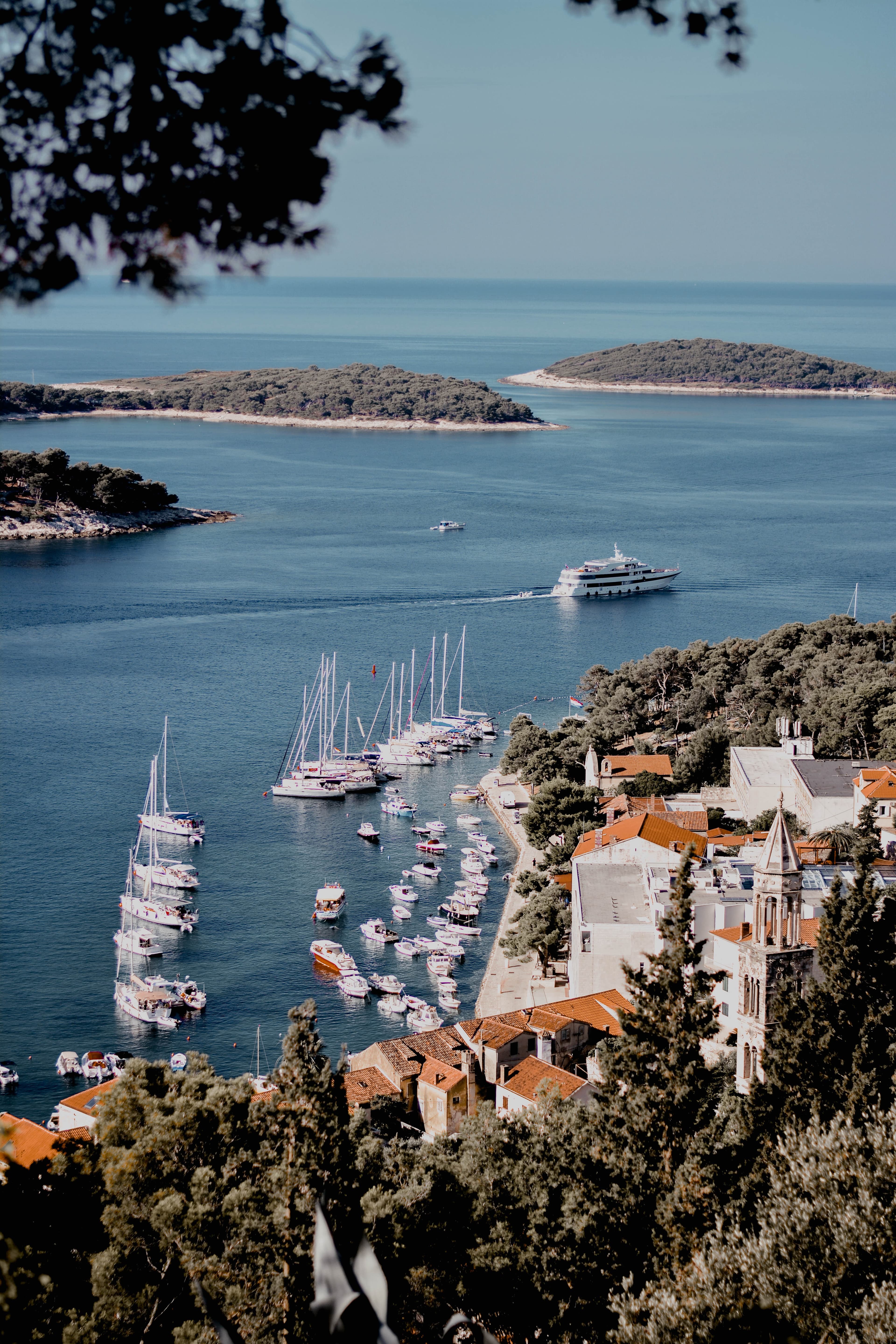 view of boats along the coastline during daytime