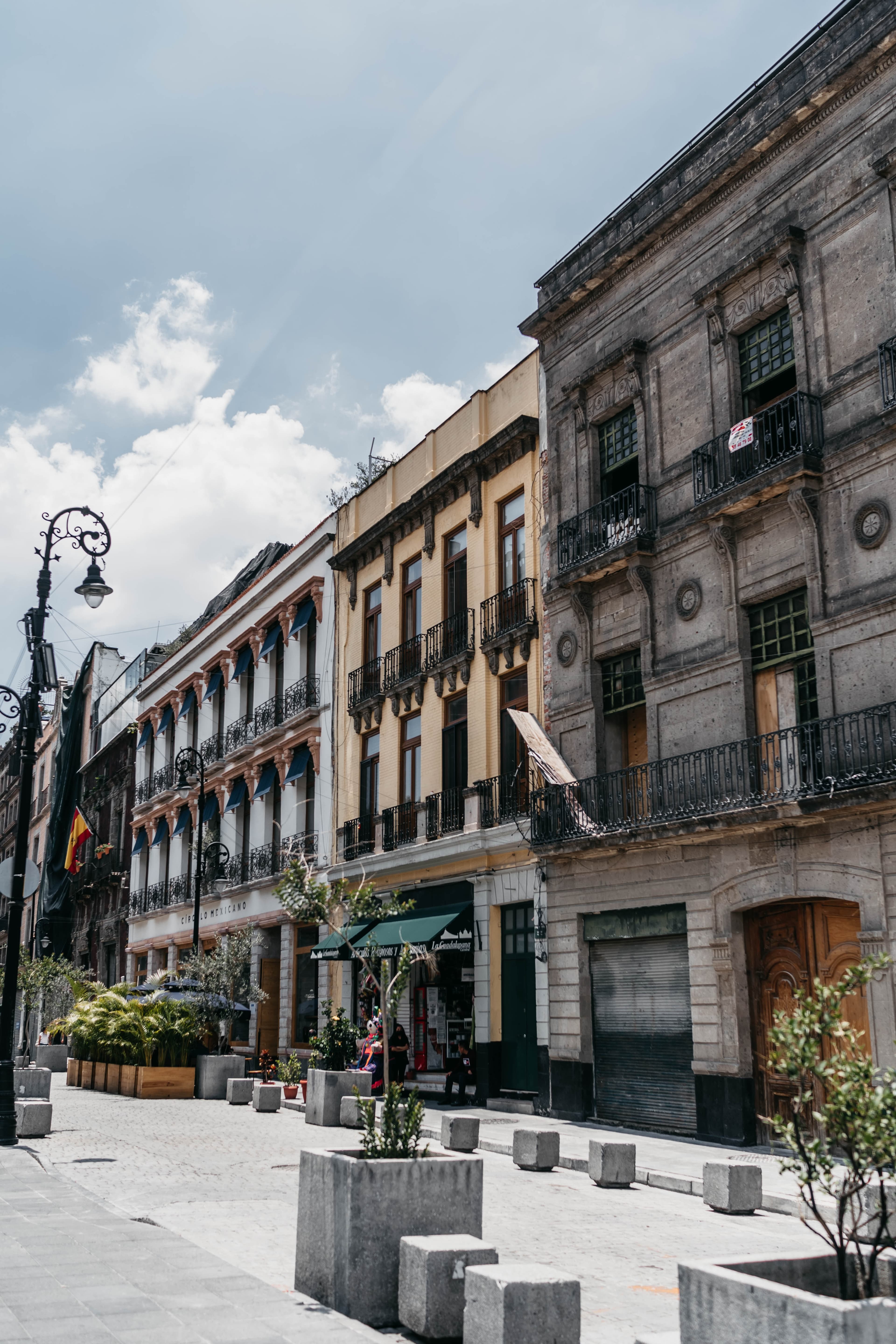 Buildings next to street during daytime
