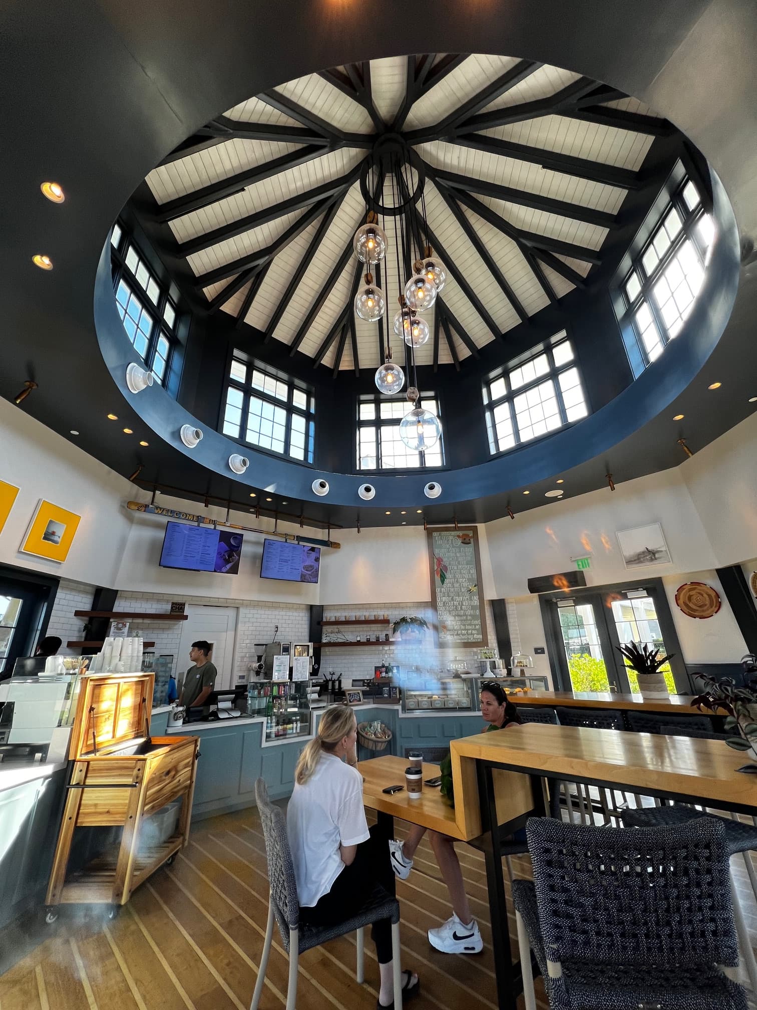 A coffee shop with a a domed, painted ceiling