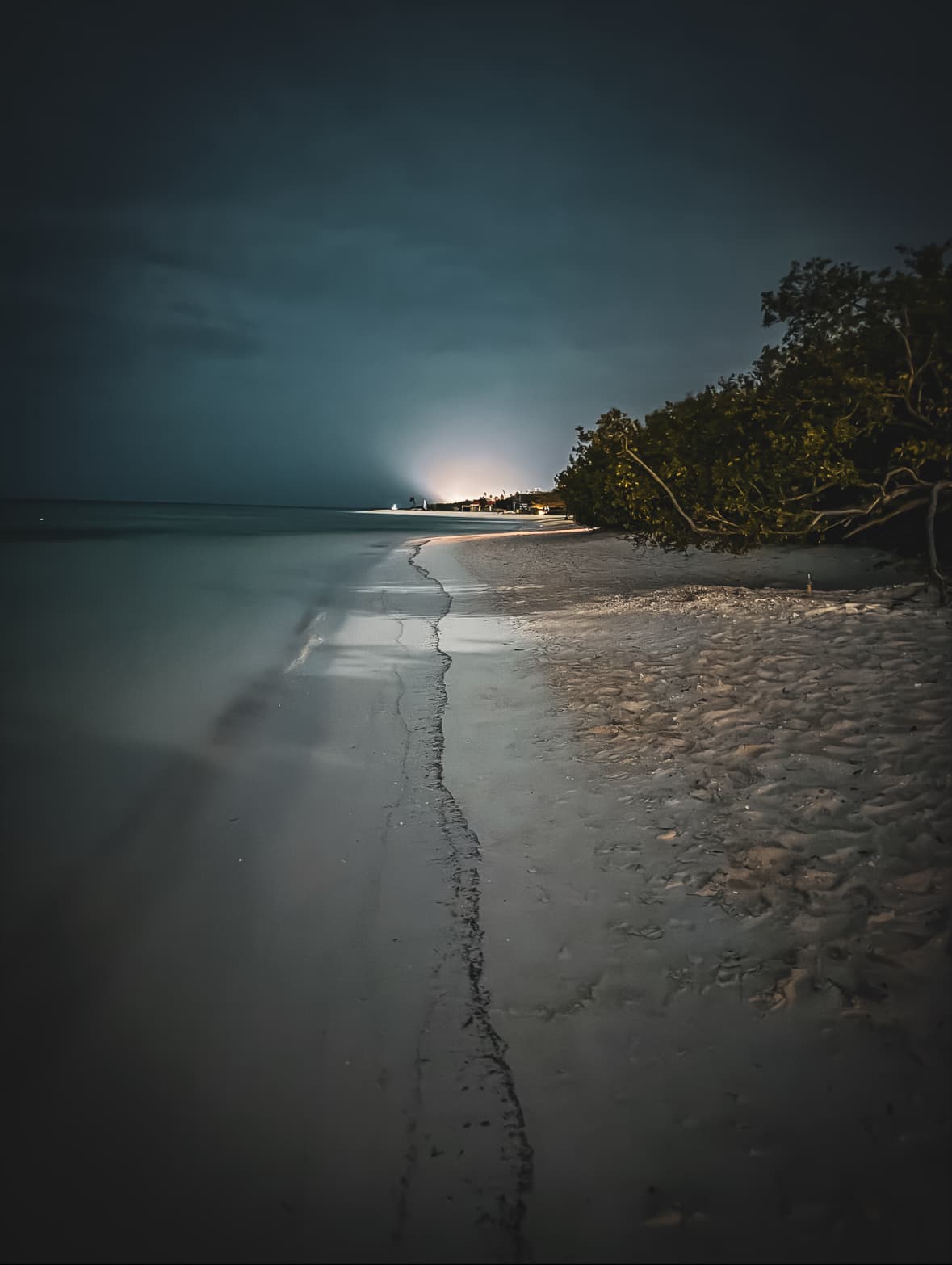 View of the beach at night