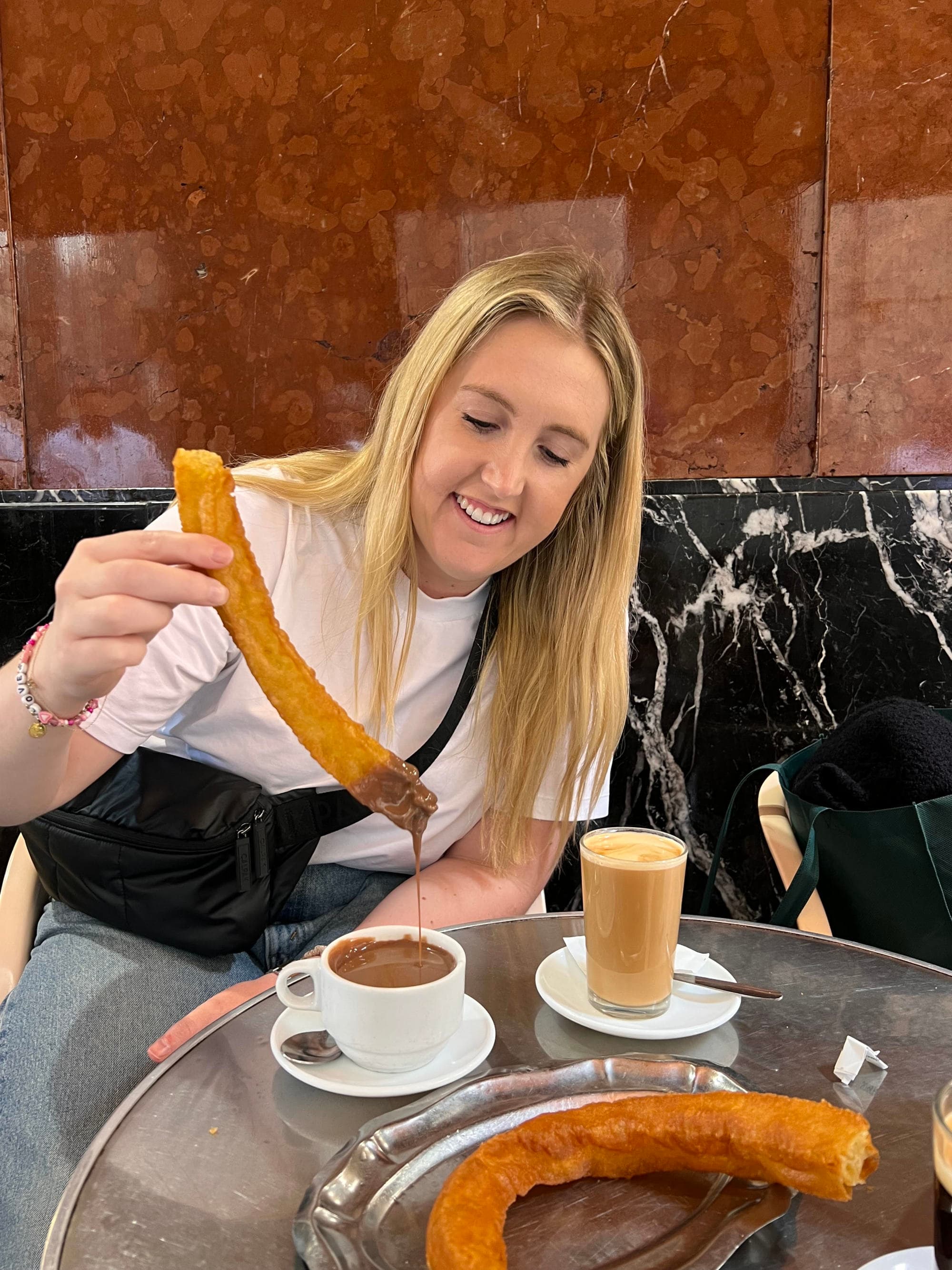 Travel advisor posing with food
