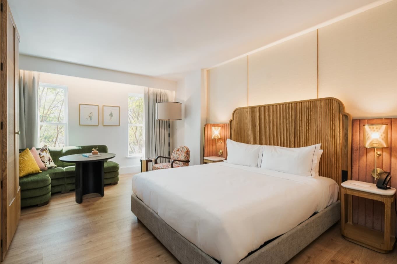 airy hotel bedroom with a bed and stylish furnishings