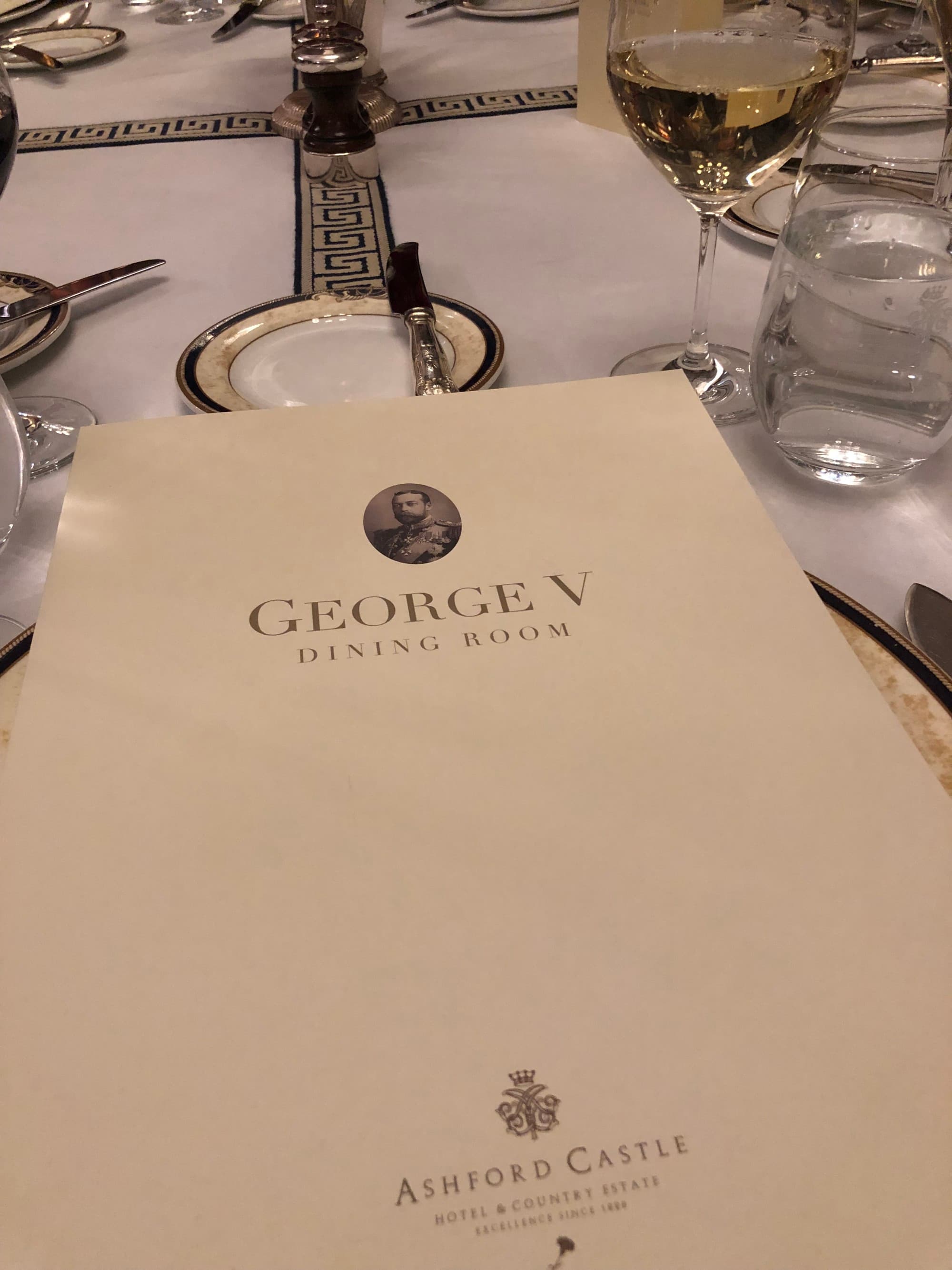 The white cover of the menu of the George V restaurant at Ashford Castle