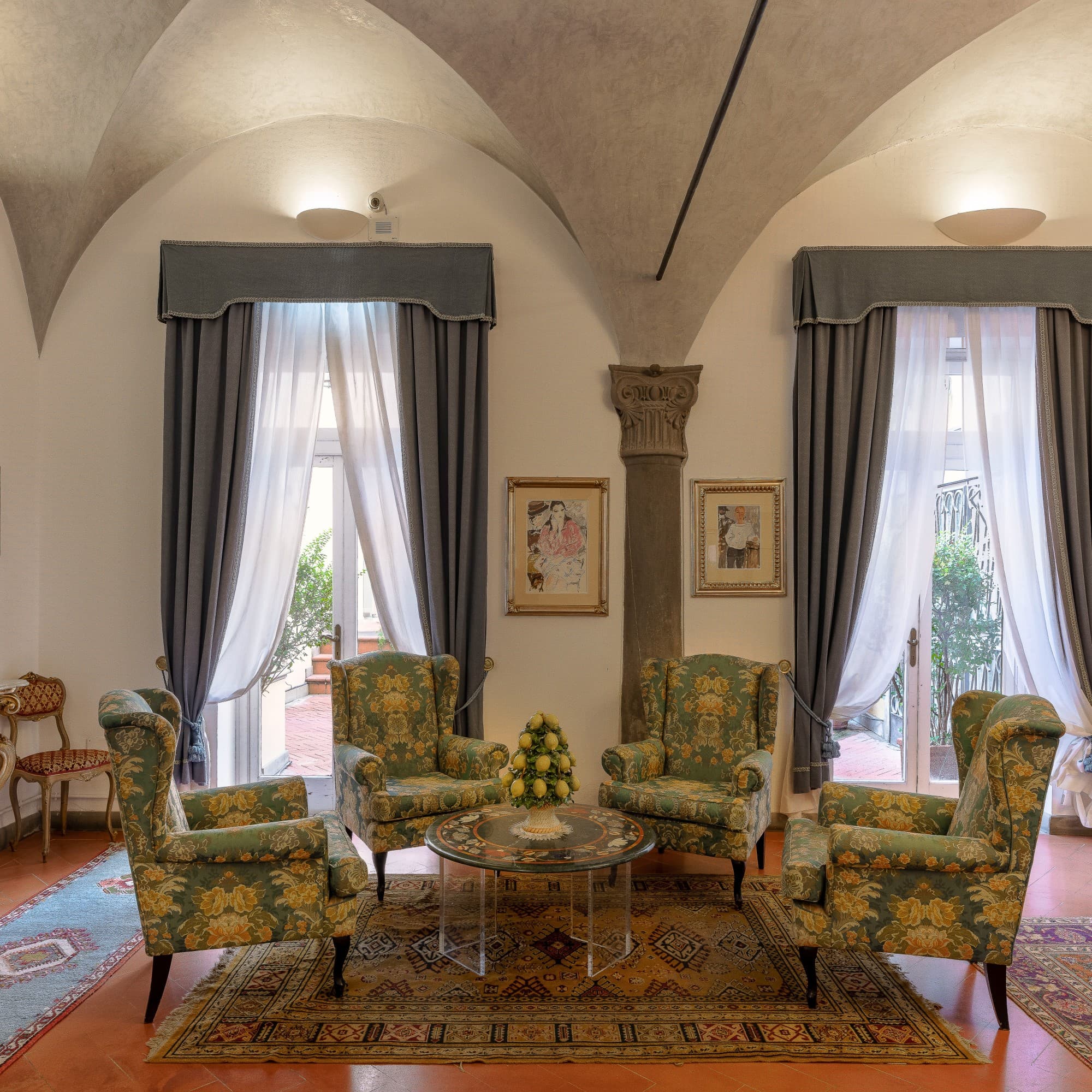patterned upholstered chairs in an ornate living room