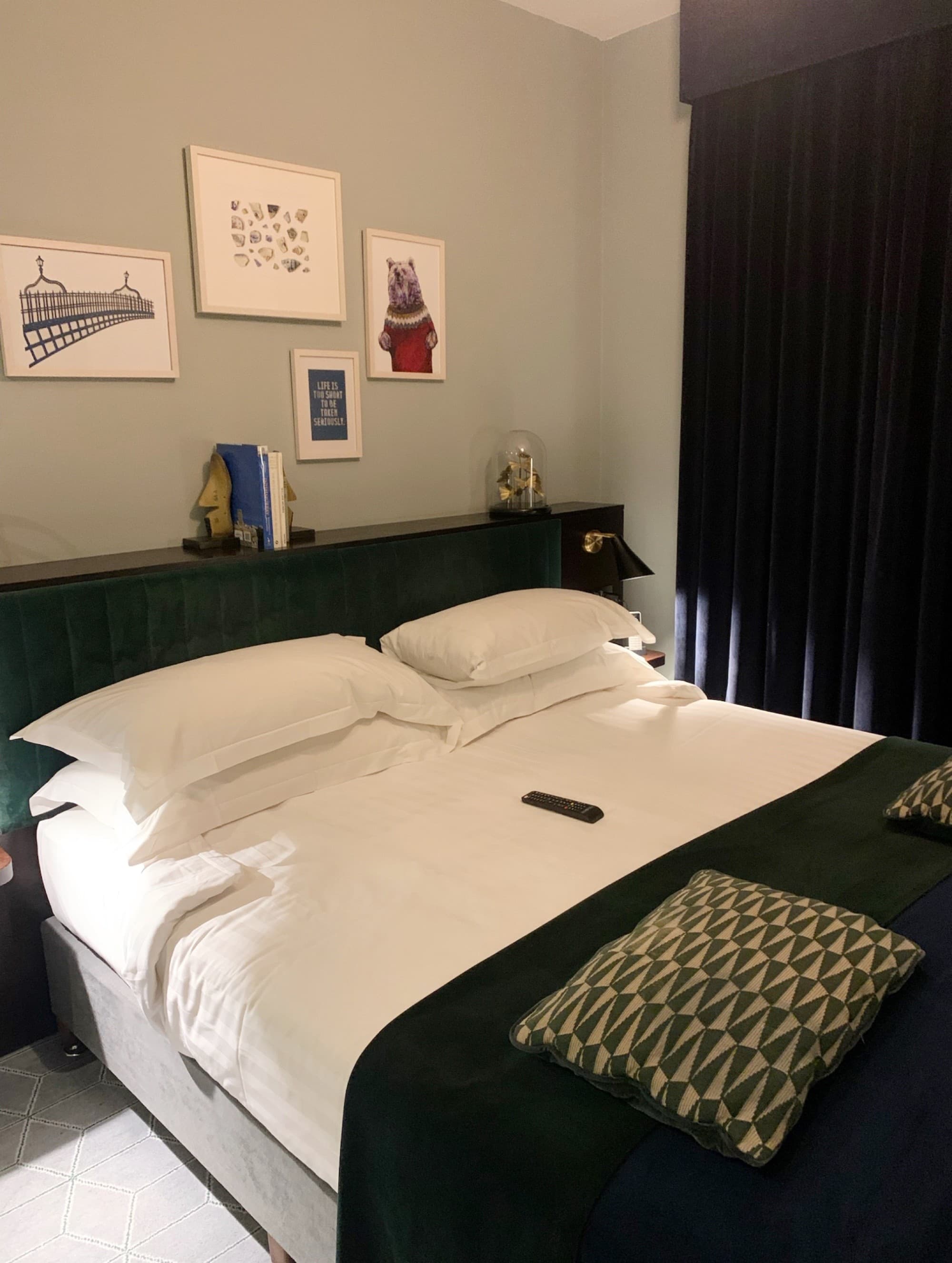 A bed in a hotel room