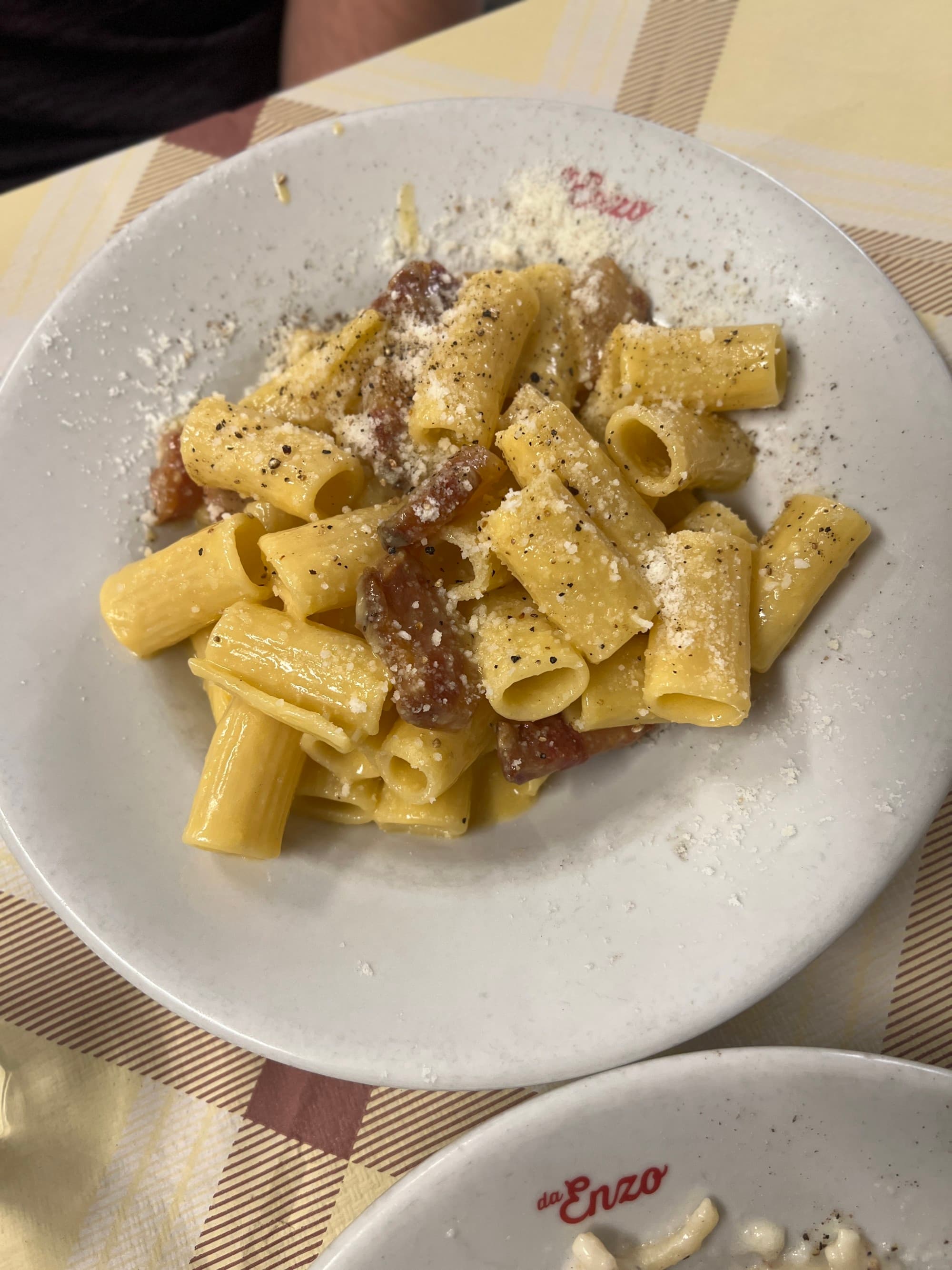 A white bowl full of pasta