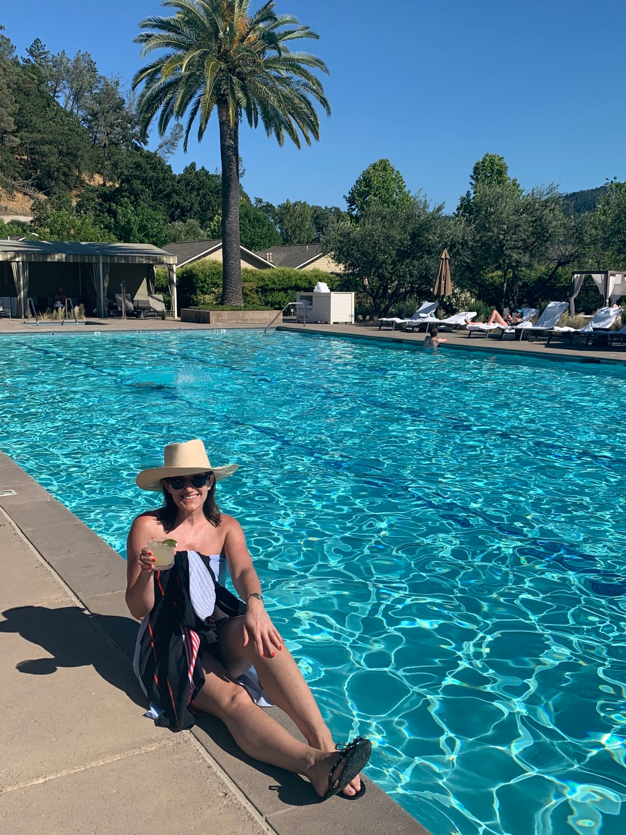 Travel advisor posing beside the beach