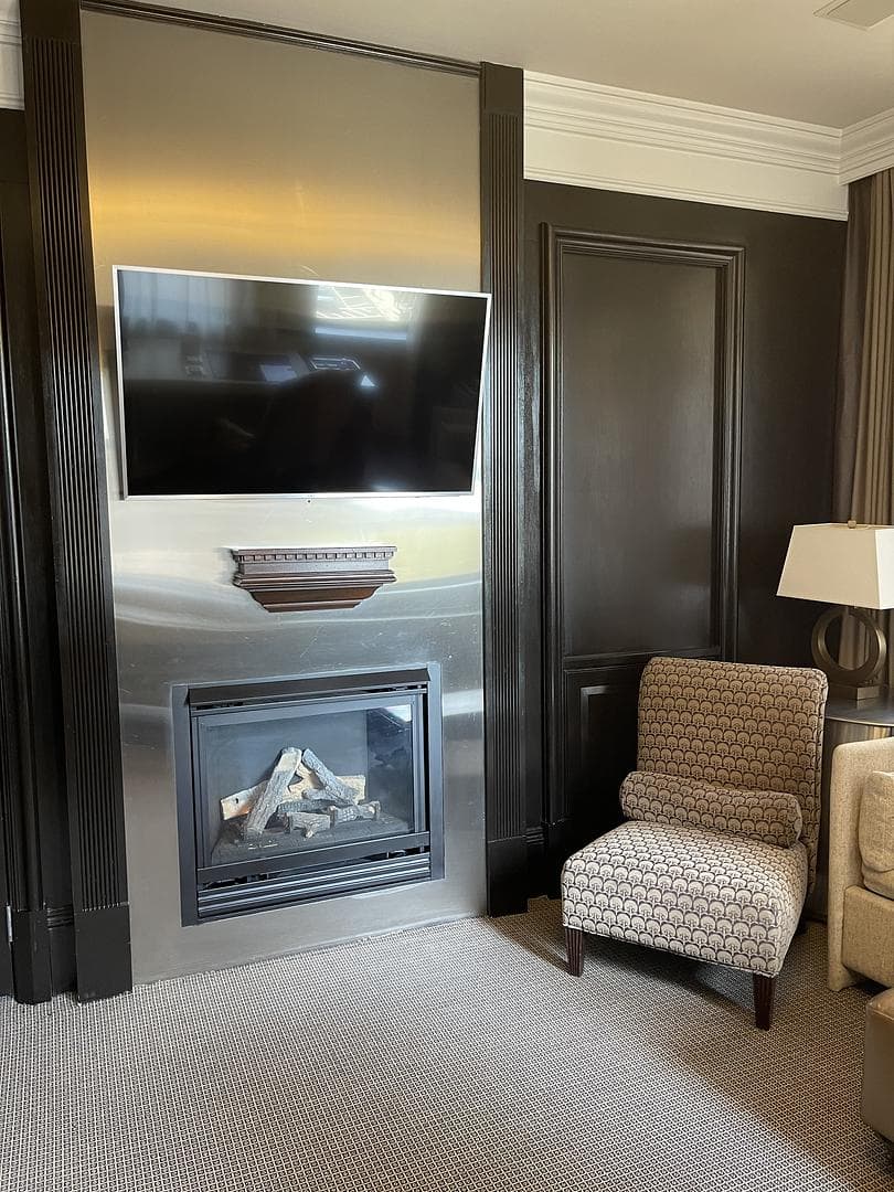 A cosy fireplace and tv corner