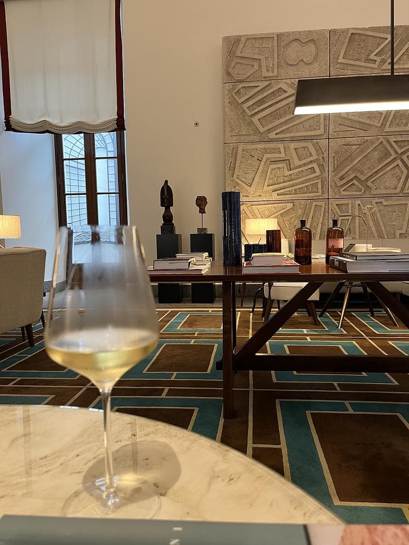 Sitting area in library while you enjoy a glass of wine