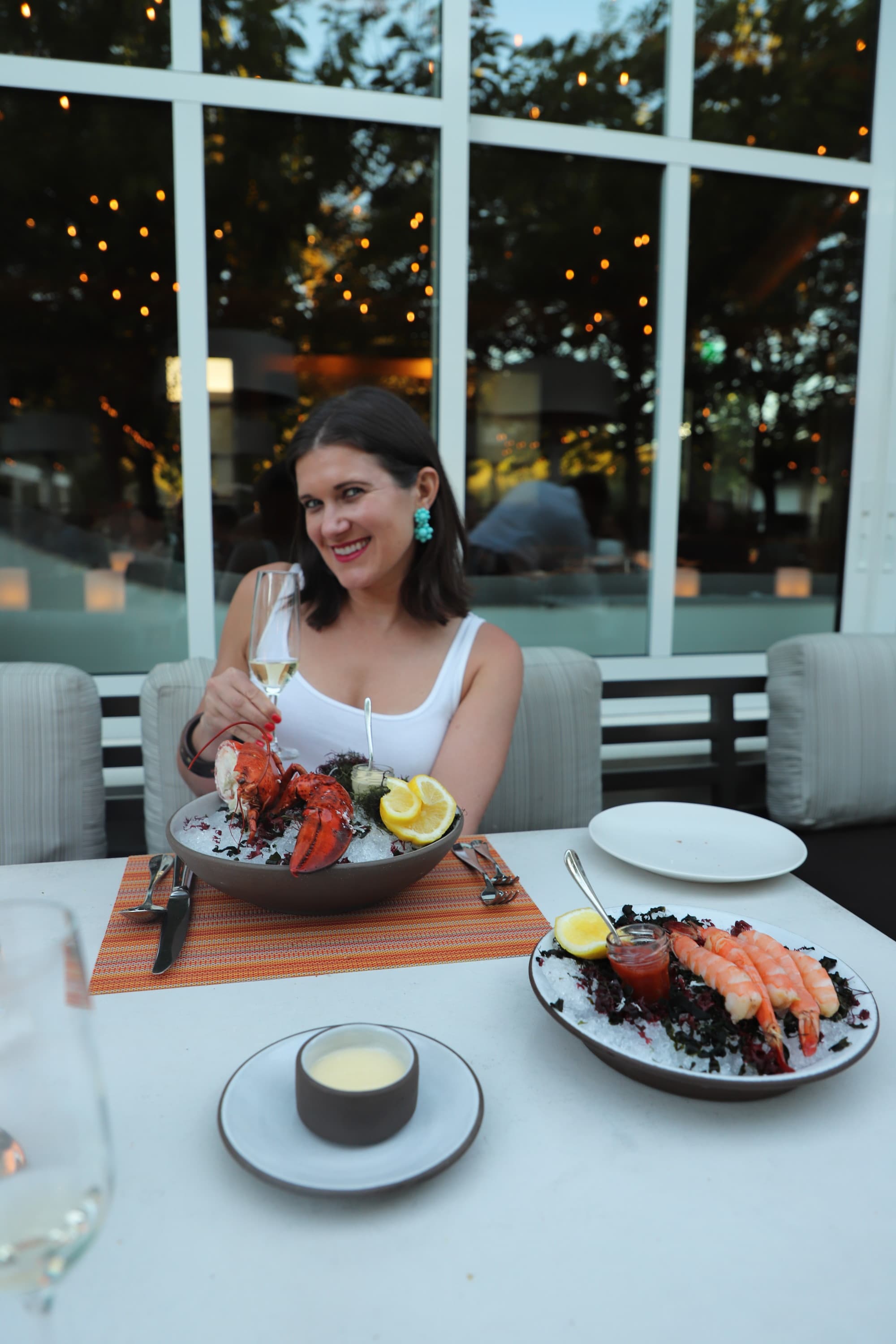 Travel advisor posing with food