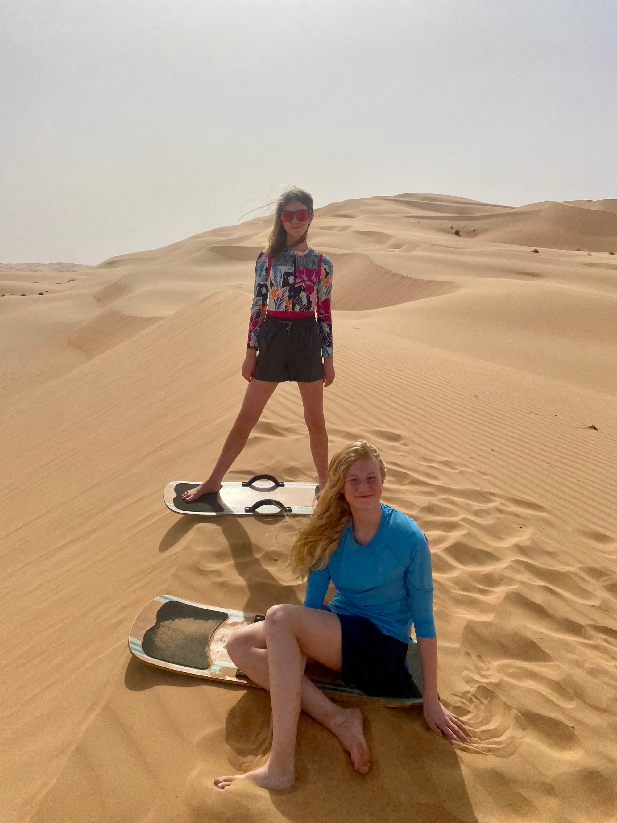 Travel advisor posing in desert