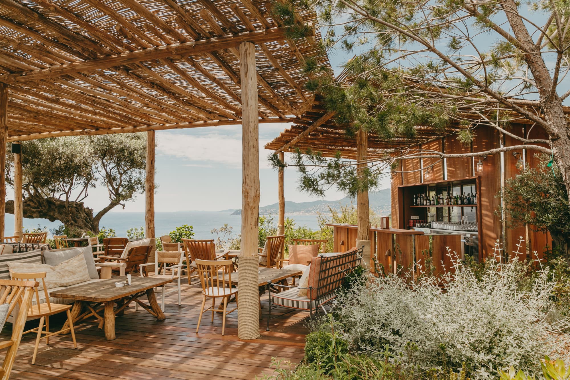 an outdoor eating area overlooking the sea