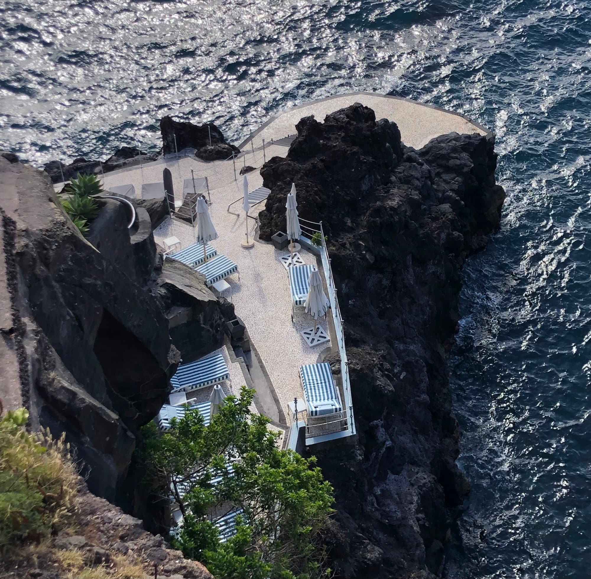 Reids Seaside Terrace with the ocean and some rocks in the distance