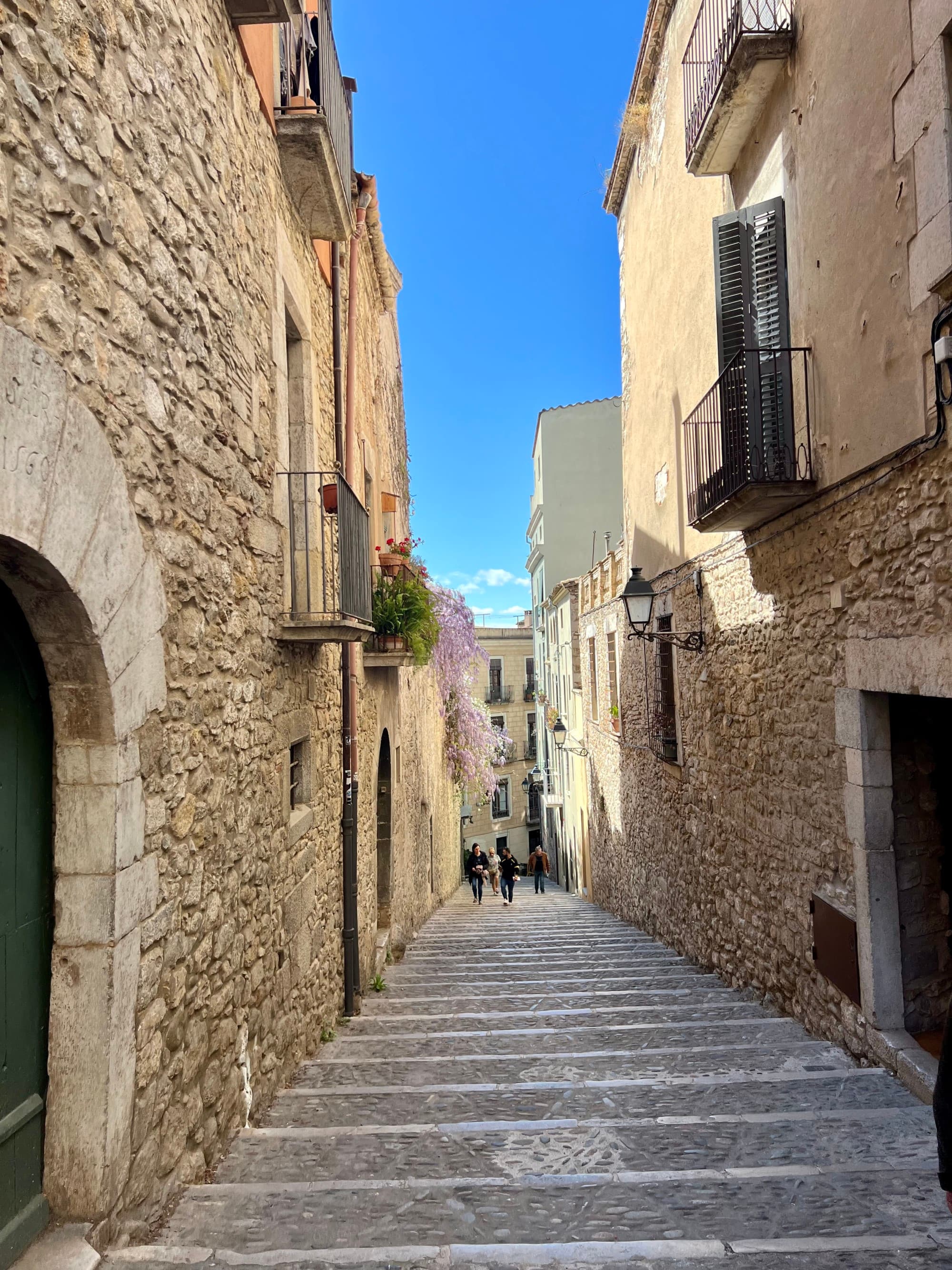 The narrow winding streets lead either up to the ancient all or down to the Jewish Quarter.