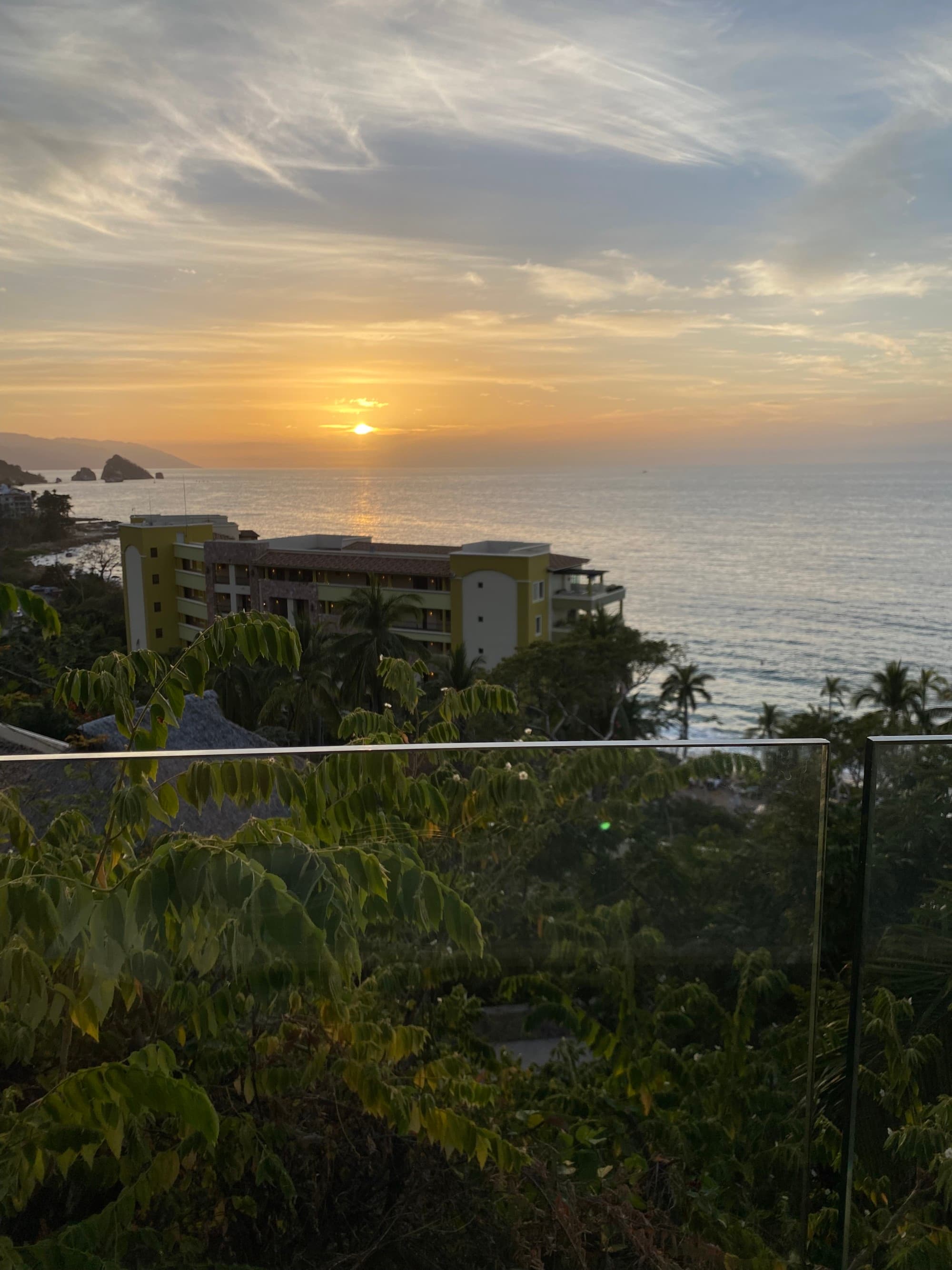 View of the beach with a sunset over the sunset
