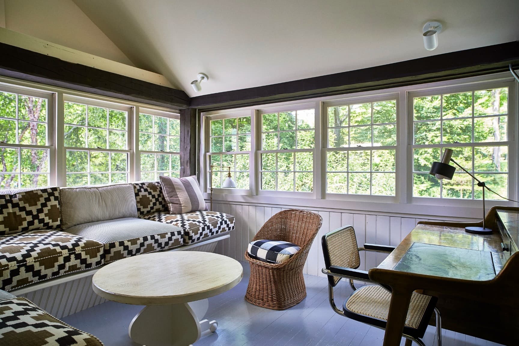sunroom with window seat and windows