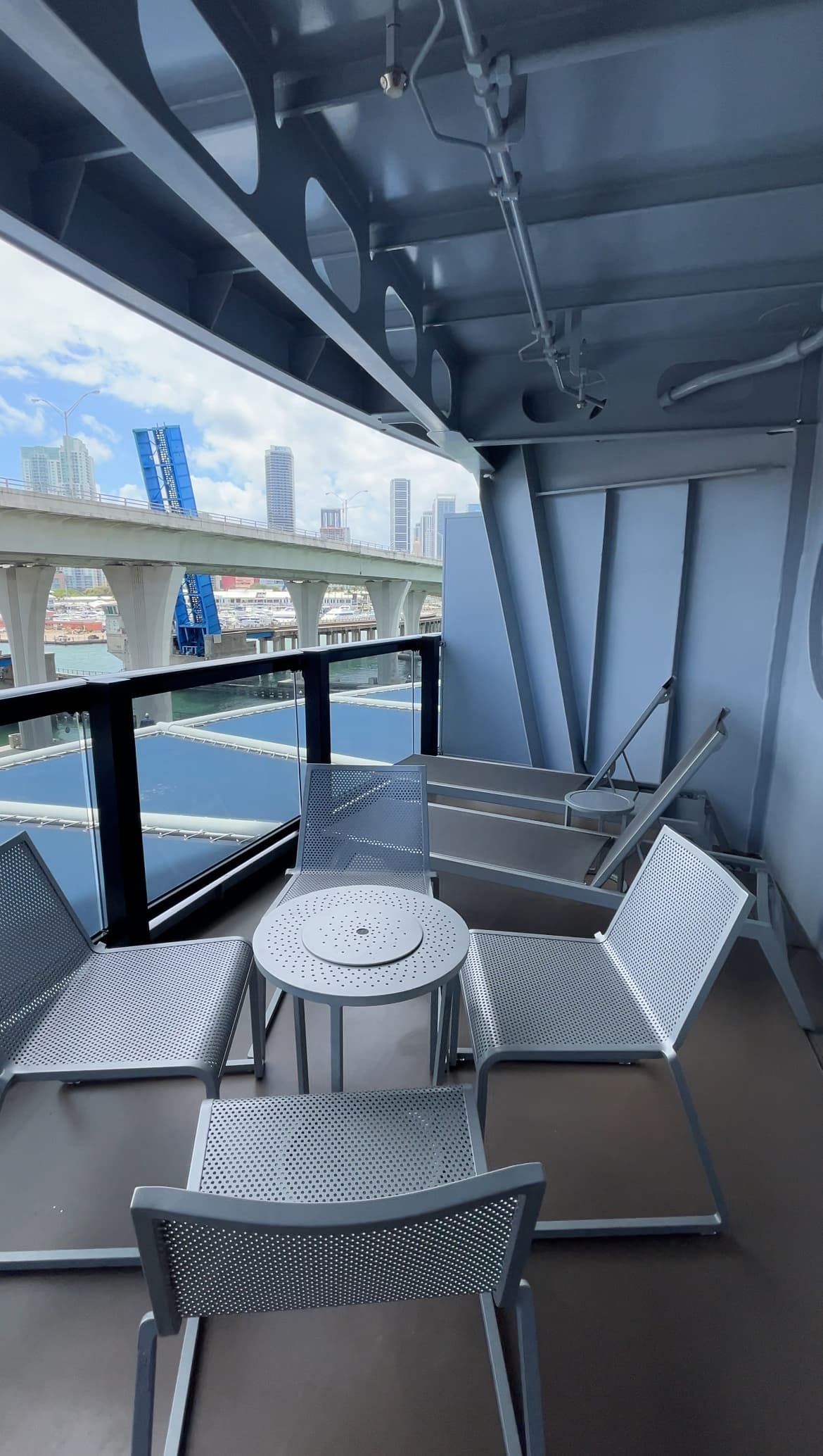 A balcony seating area on a cruise ship