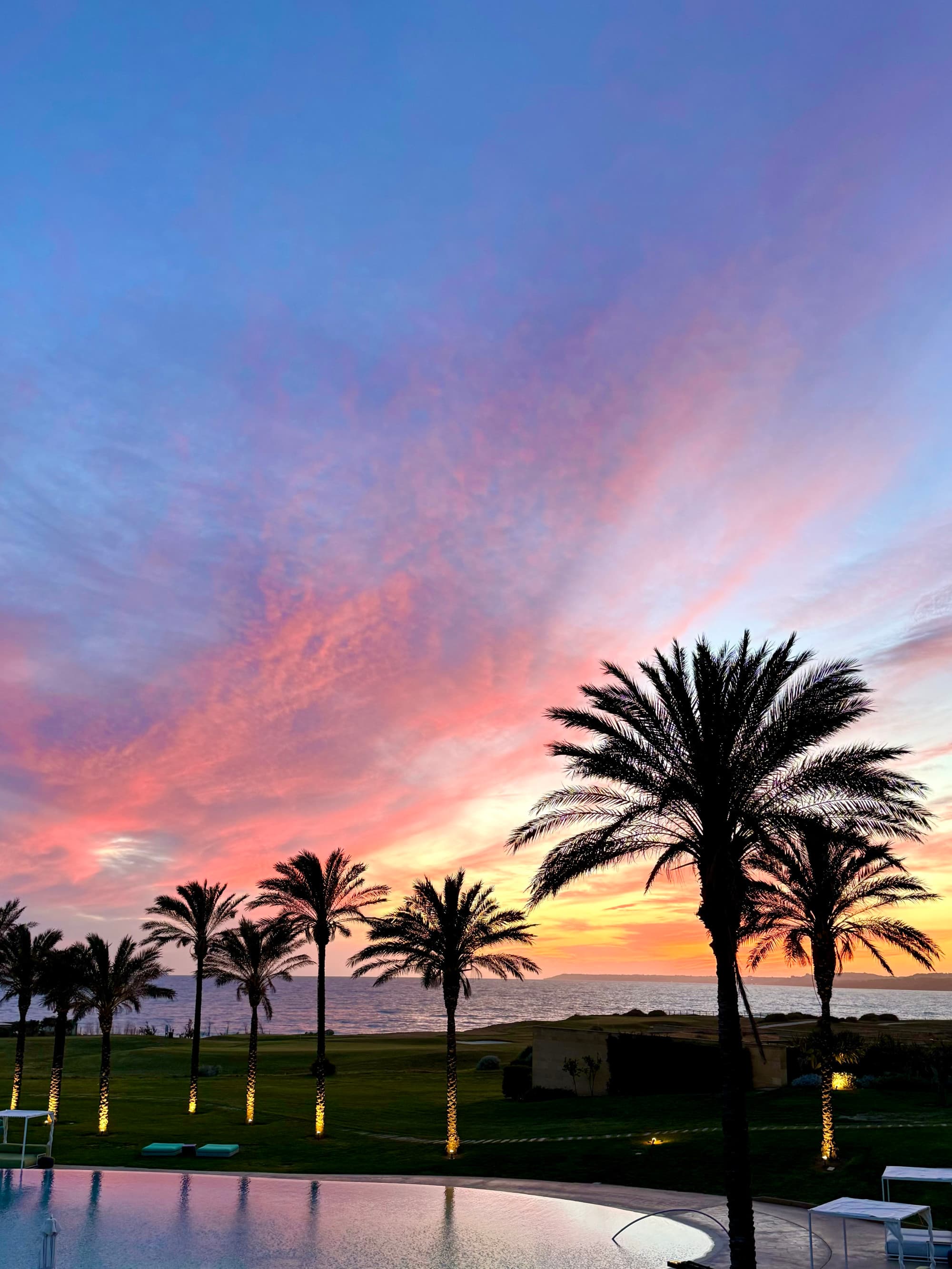 Sunset at Rocco Forte Vedura Hotel with beautiful pink, yellow and orange shades