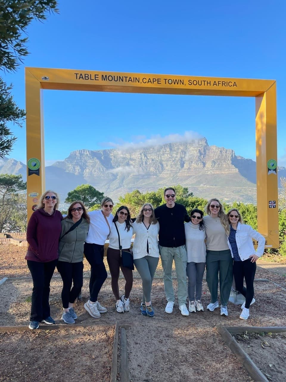 FORA FAM team with Table Mountain backdrop.